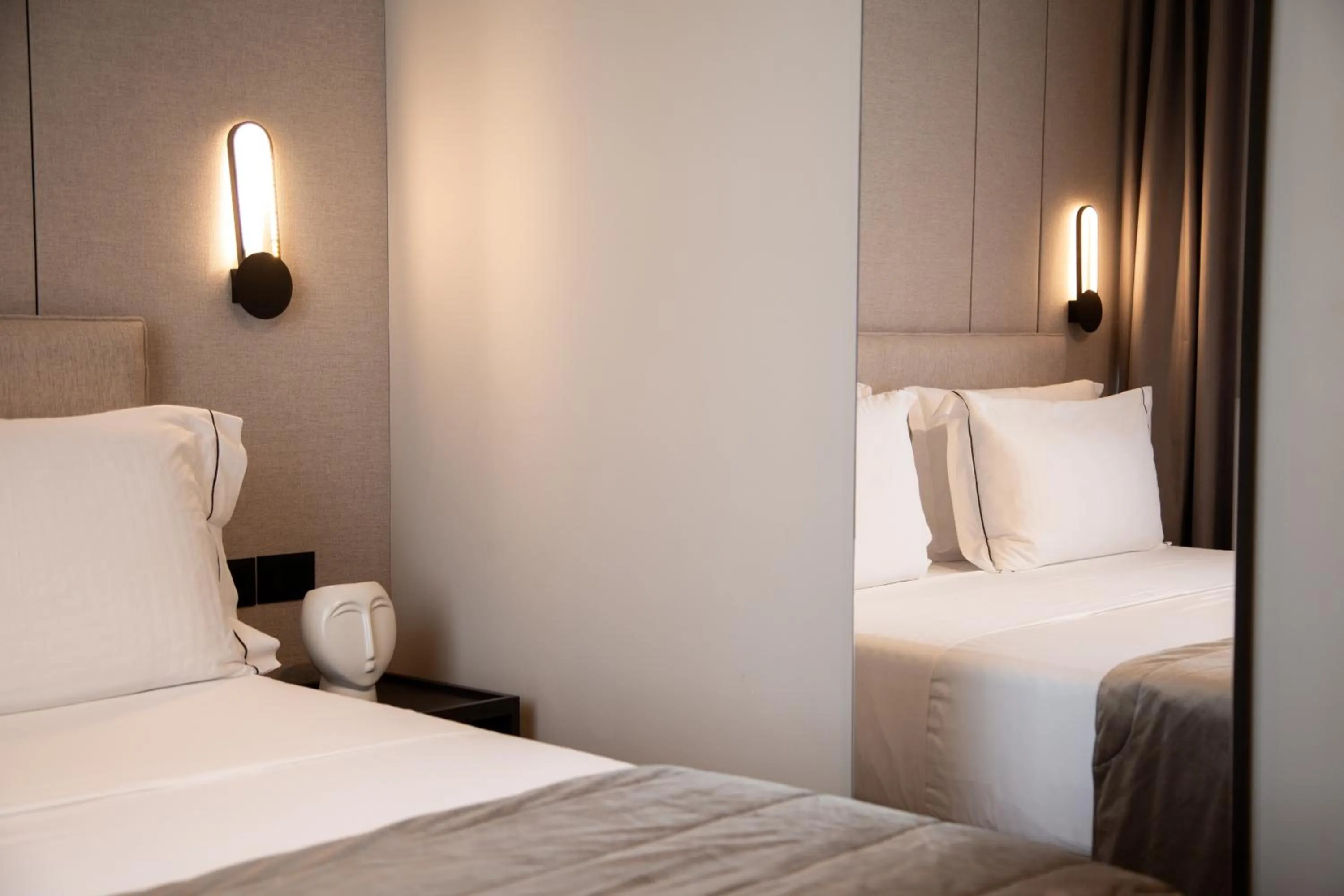 Bed in Miramare Boutique Hotel