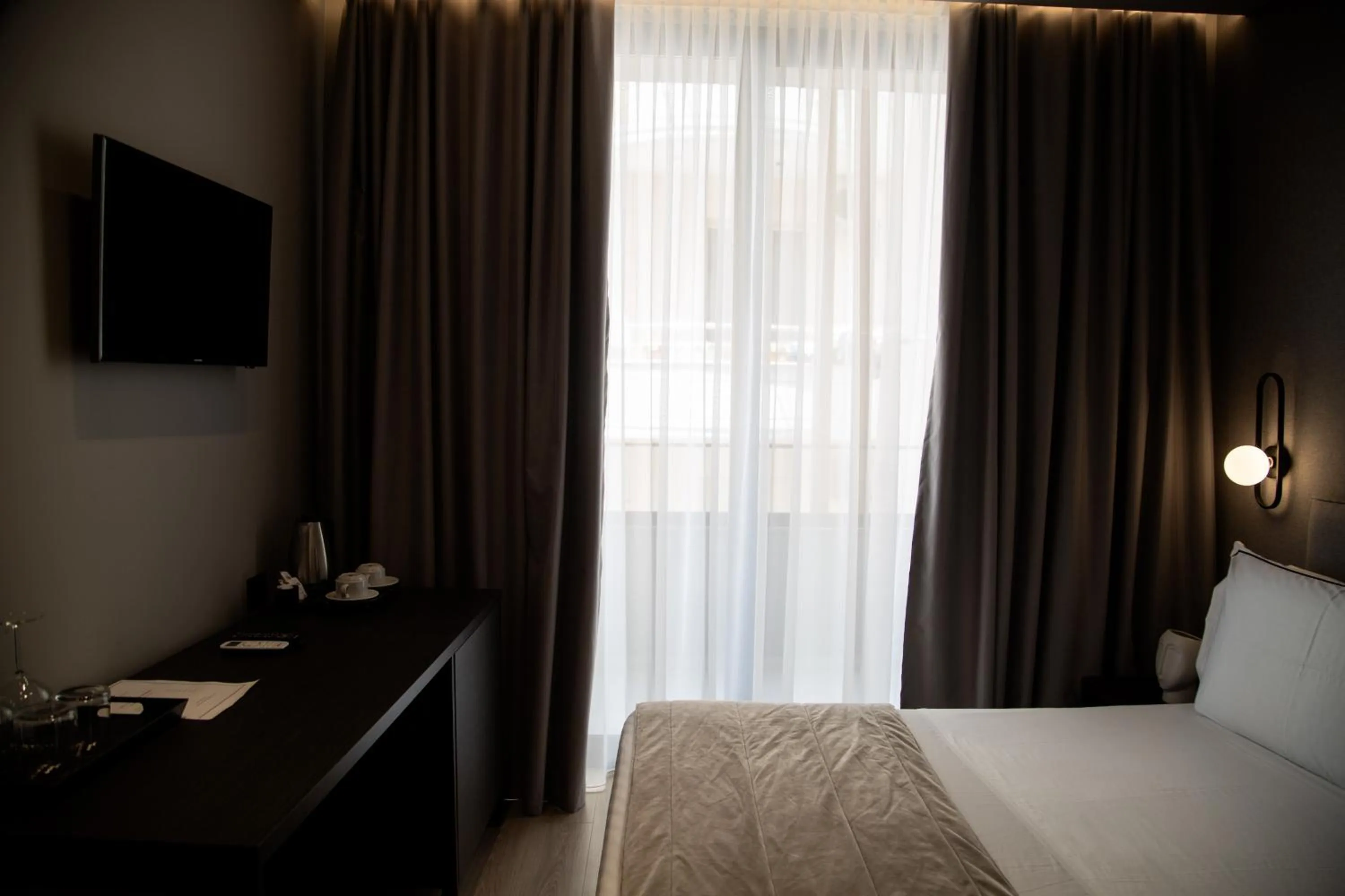 Bed in Miramare Boutique Hotel