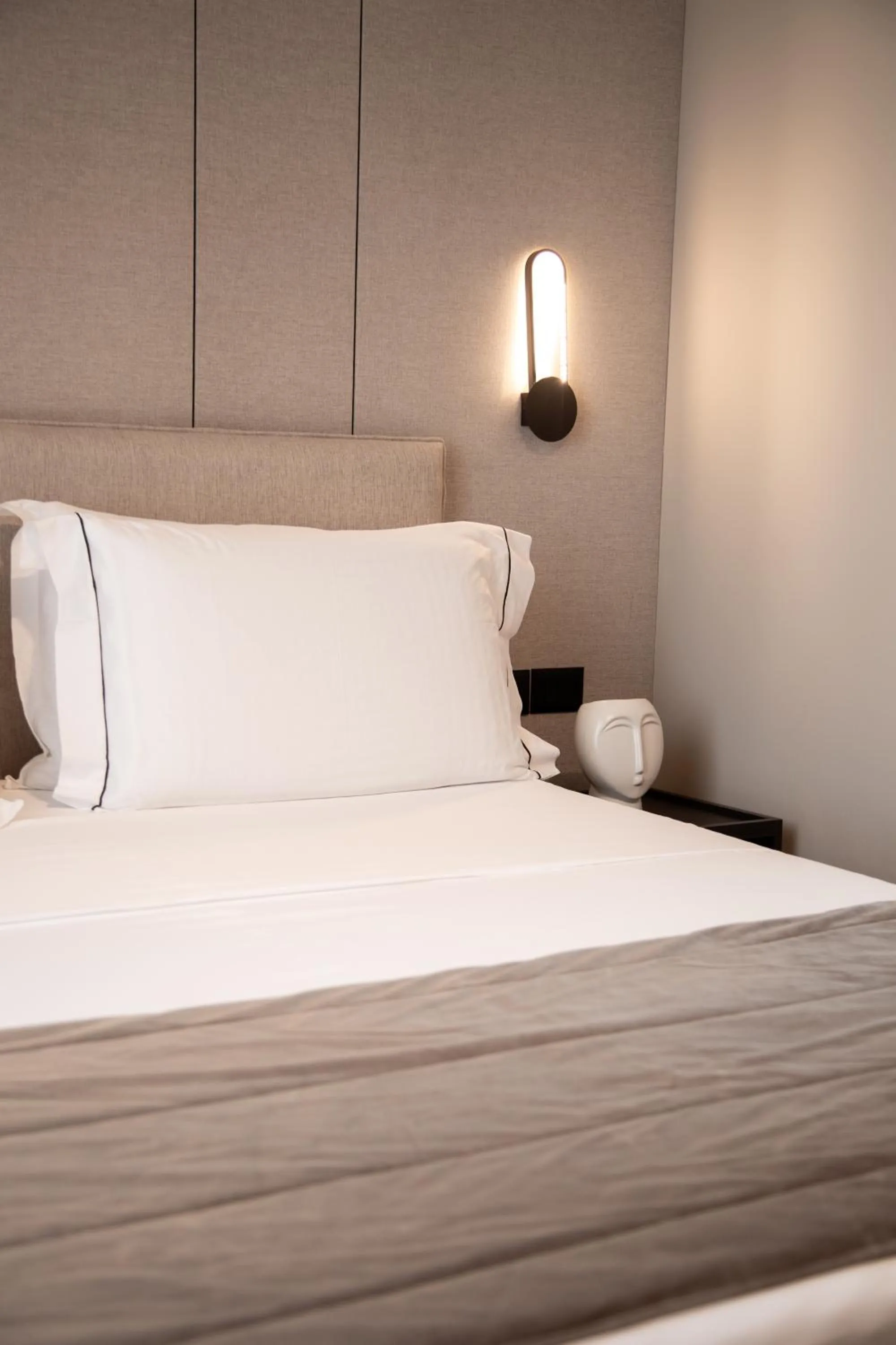 Bed in Miramare Boutique Hotel