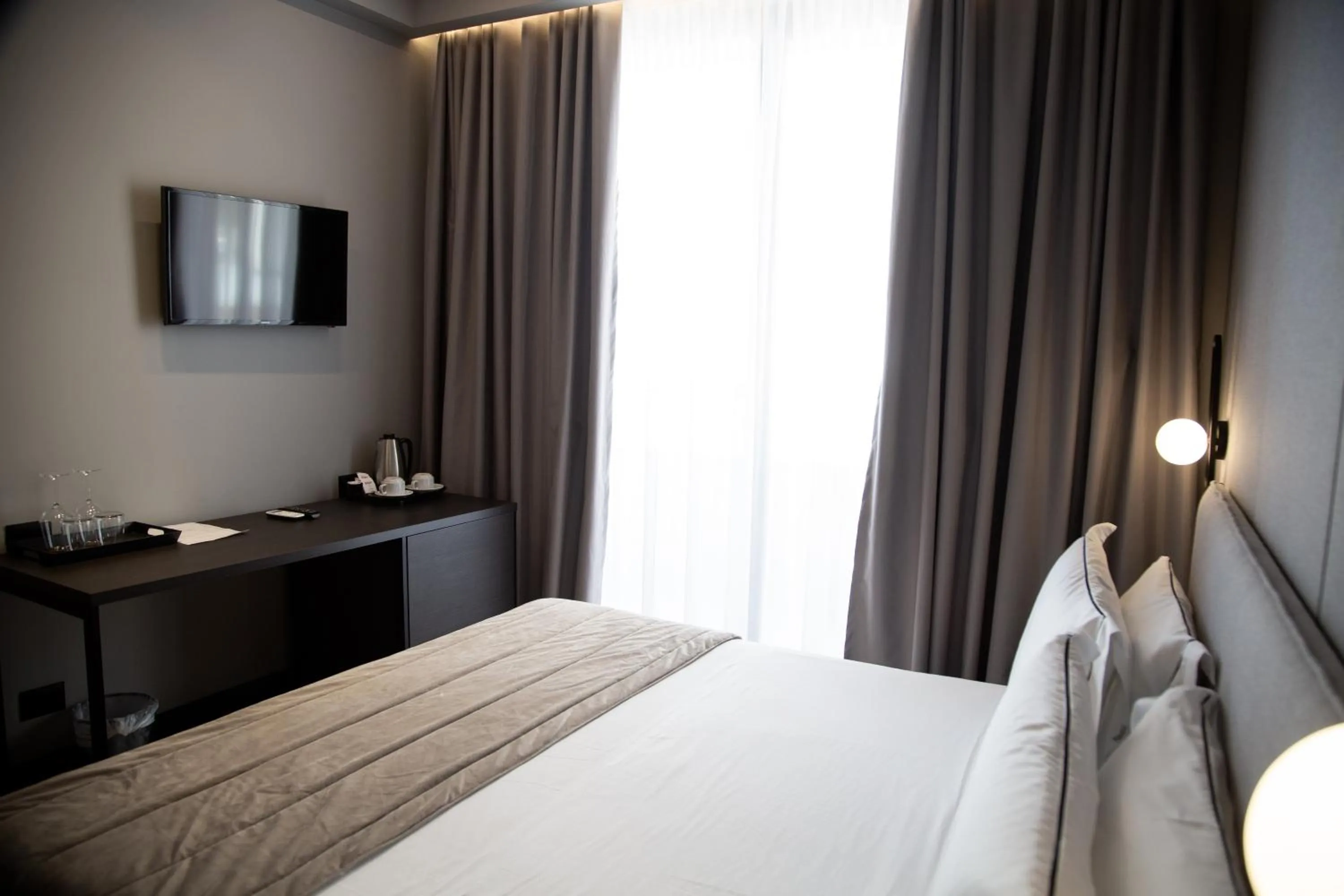 Bed in Miramare Boutique Hotel