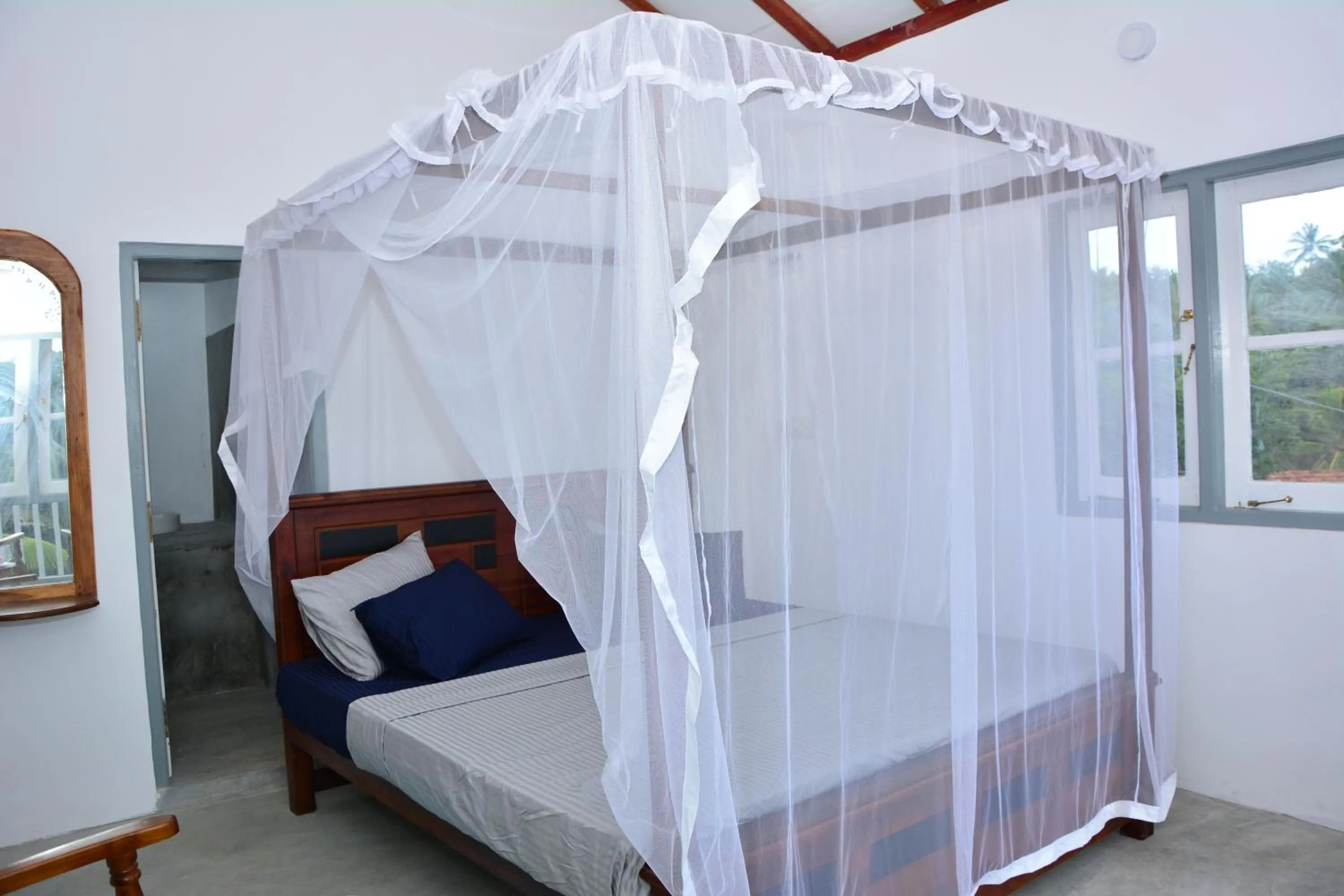 Bed in Hiru Villa Tangalle