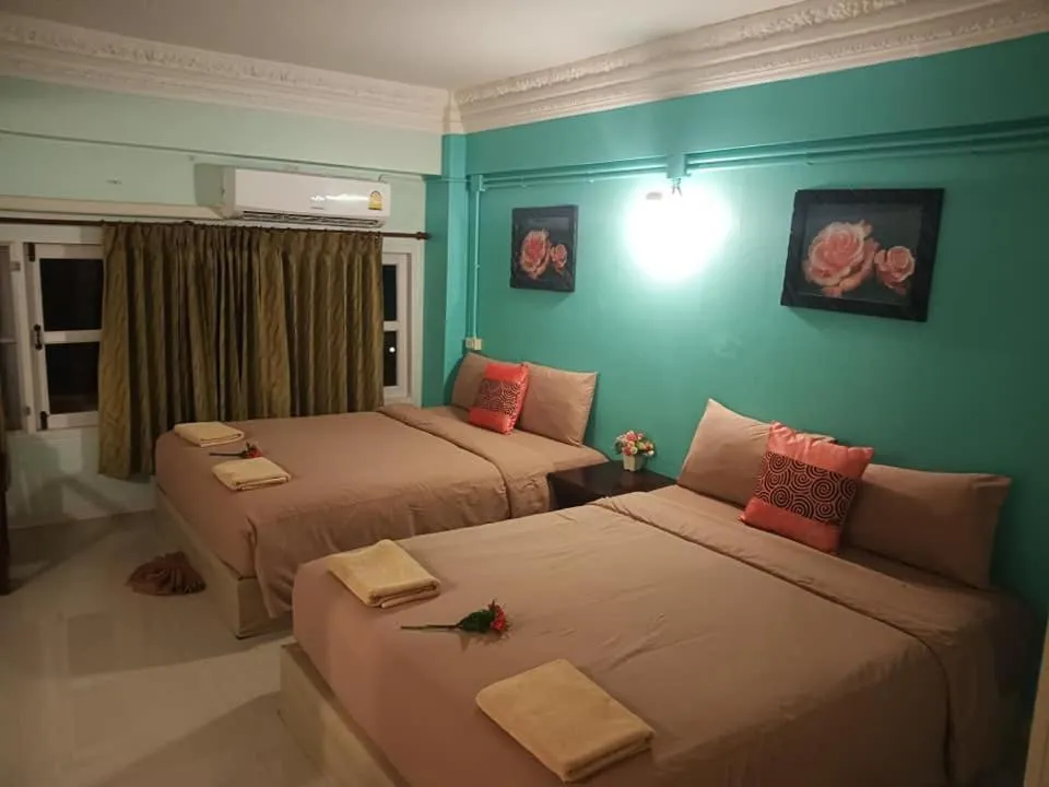 Bed in Anchalee Resort