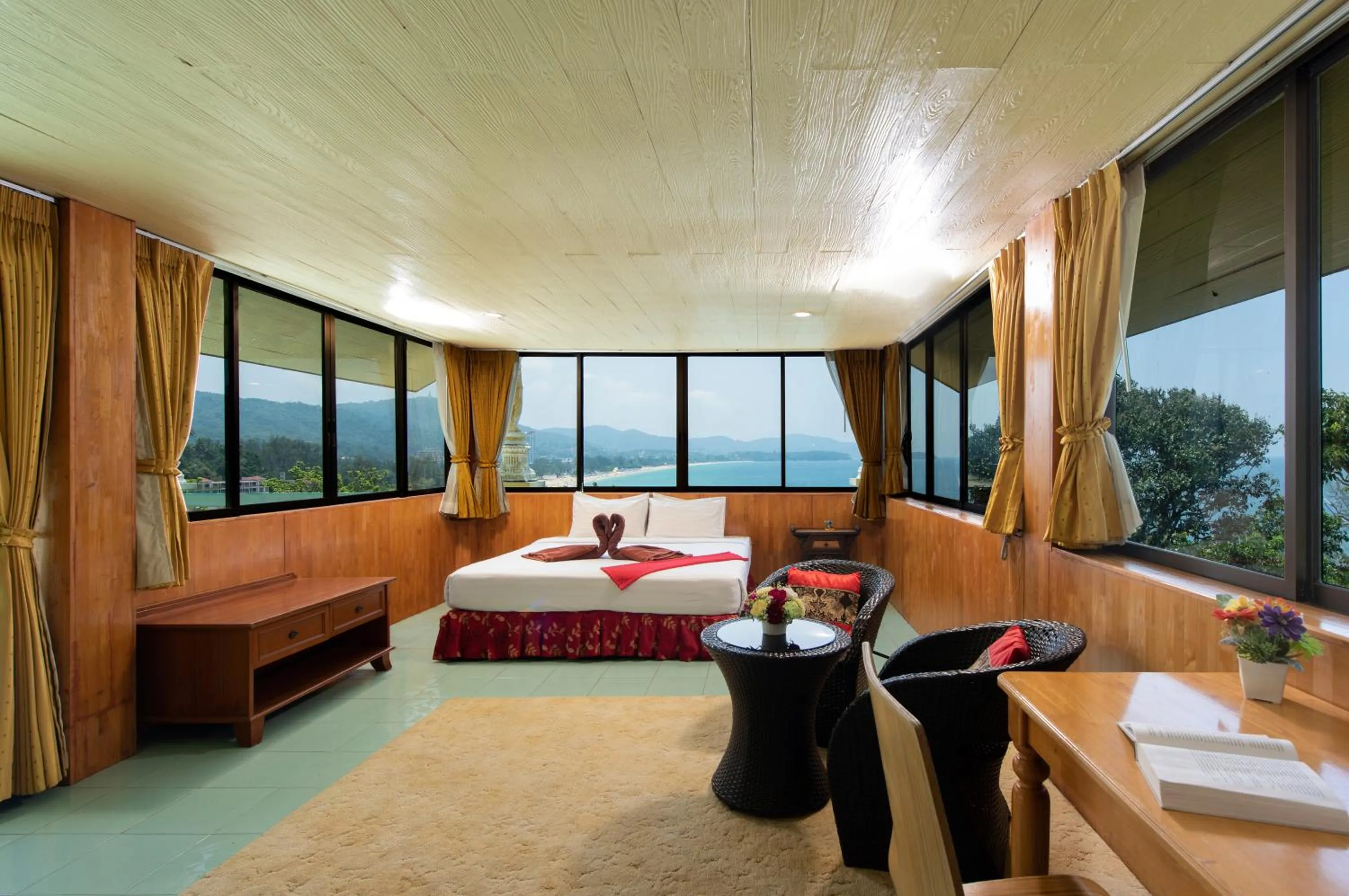 Bed in Baan Karon Hill Phuket Resort