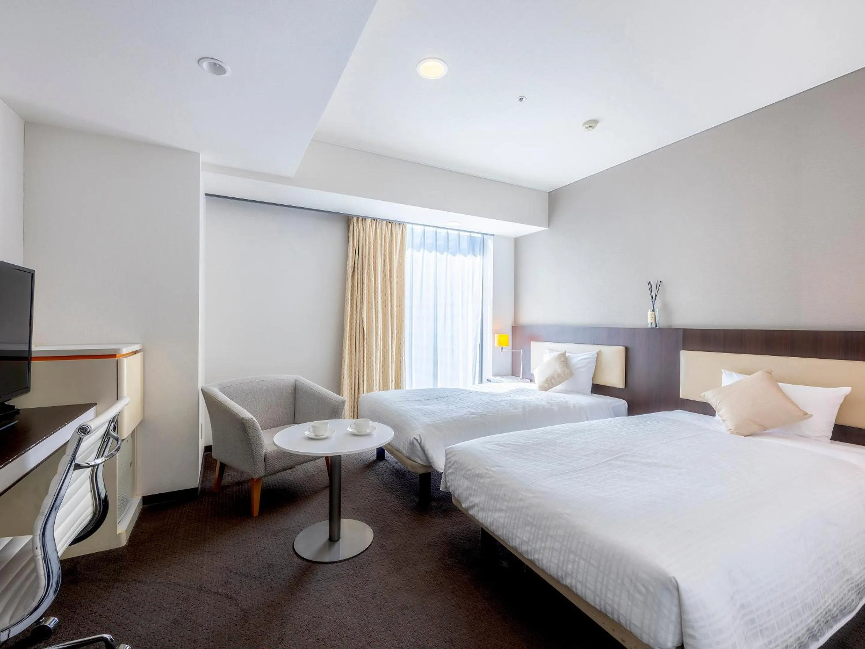 Photo of the whole room, Bed in Hotel Gracery Sapporo