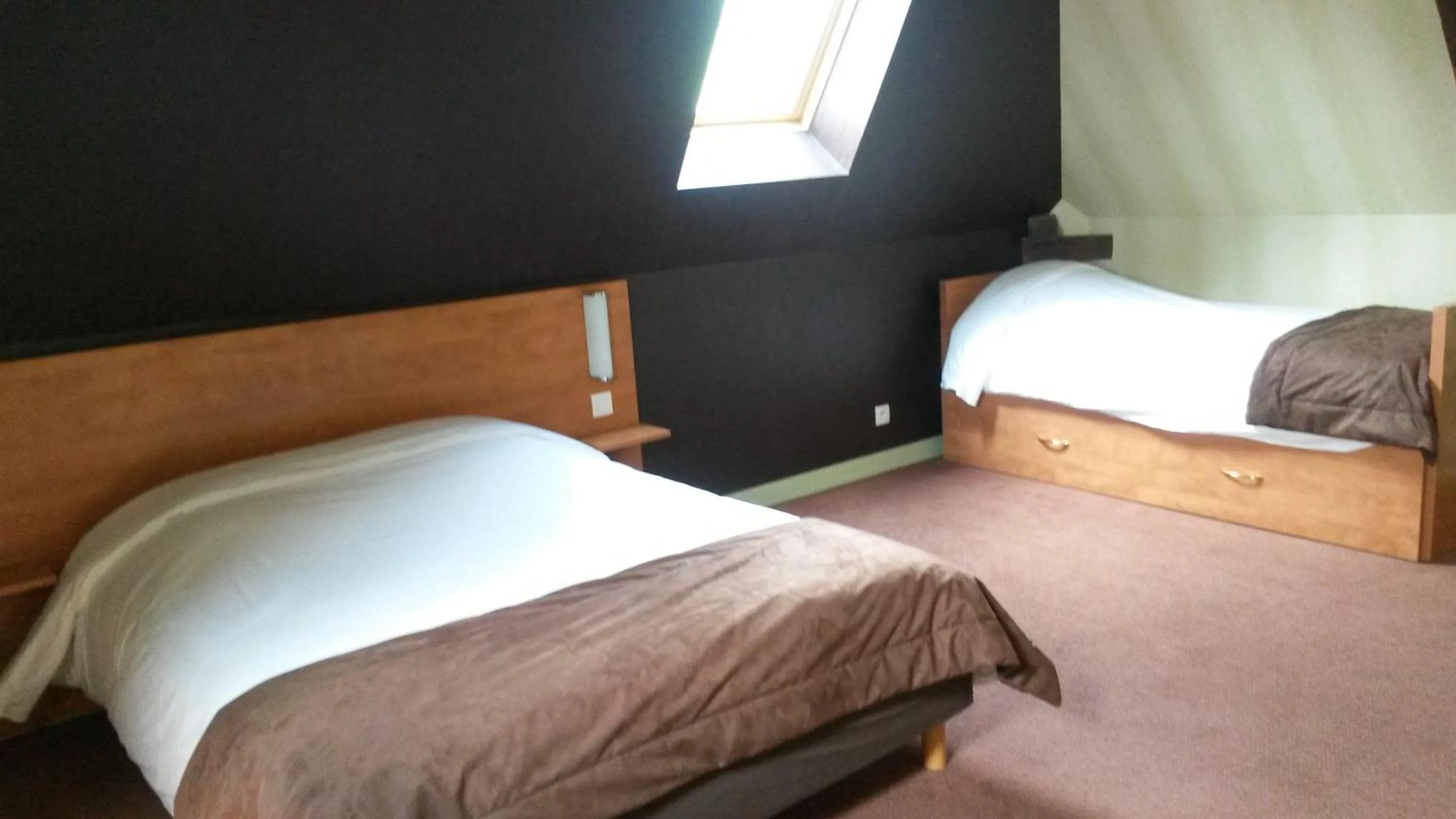 Bed in HOTEL RESTAURANT La CREPERIE Du CHATEAU