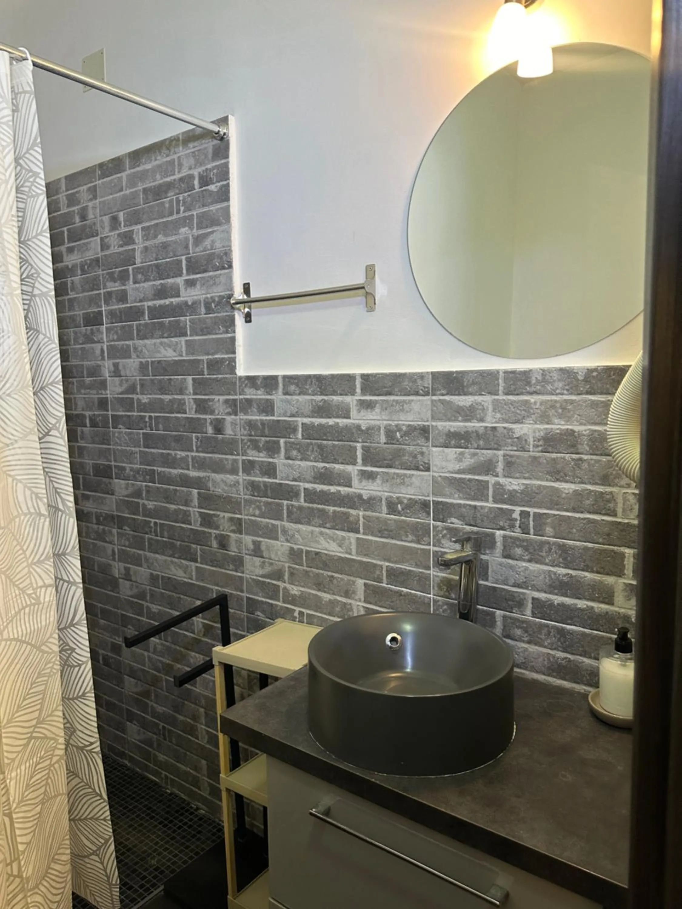 Bathroom in Candia Rooms