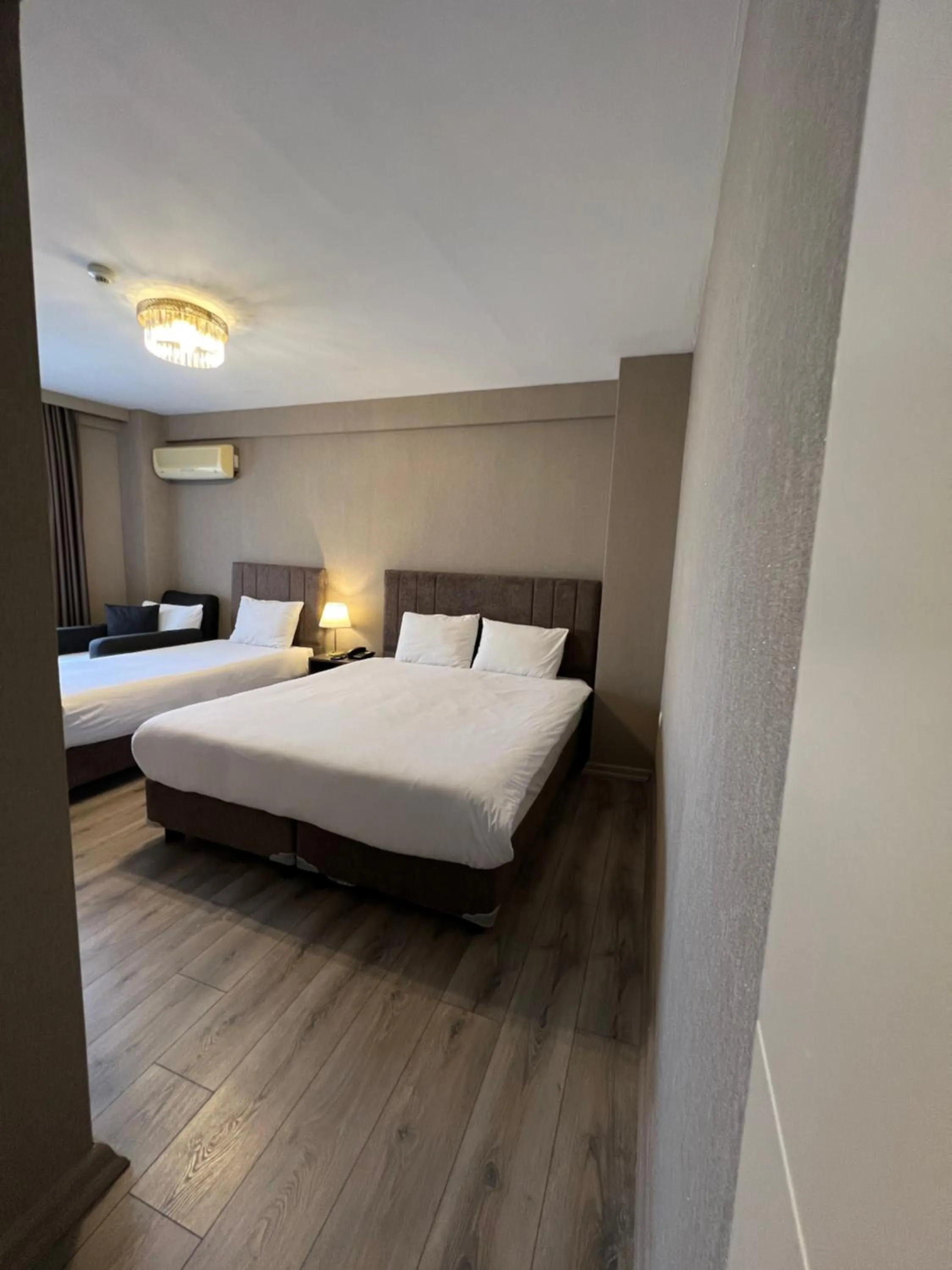 Bed in Flower Palace Hotel