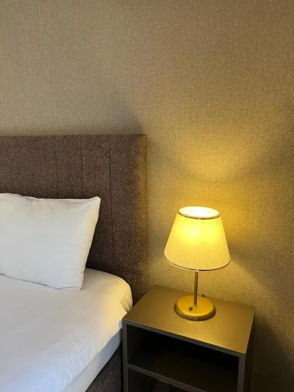 Bed in Flower Palace Hotel