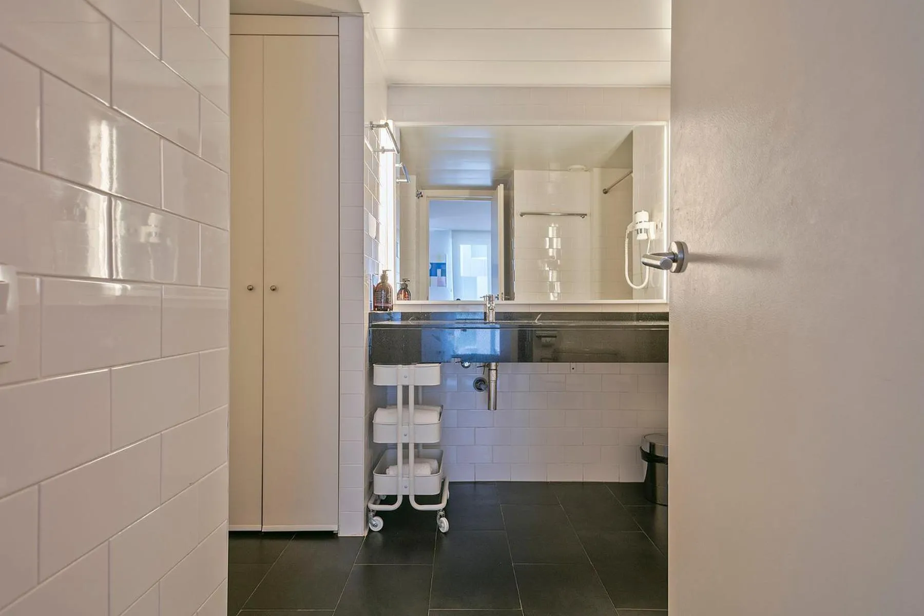 Bathroom in Lugaris Beach Apartments