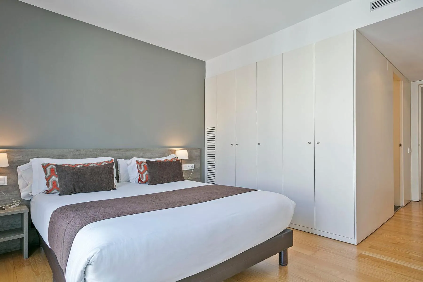 Bed in Lugaris Beach Apartments