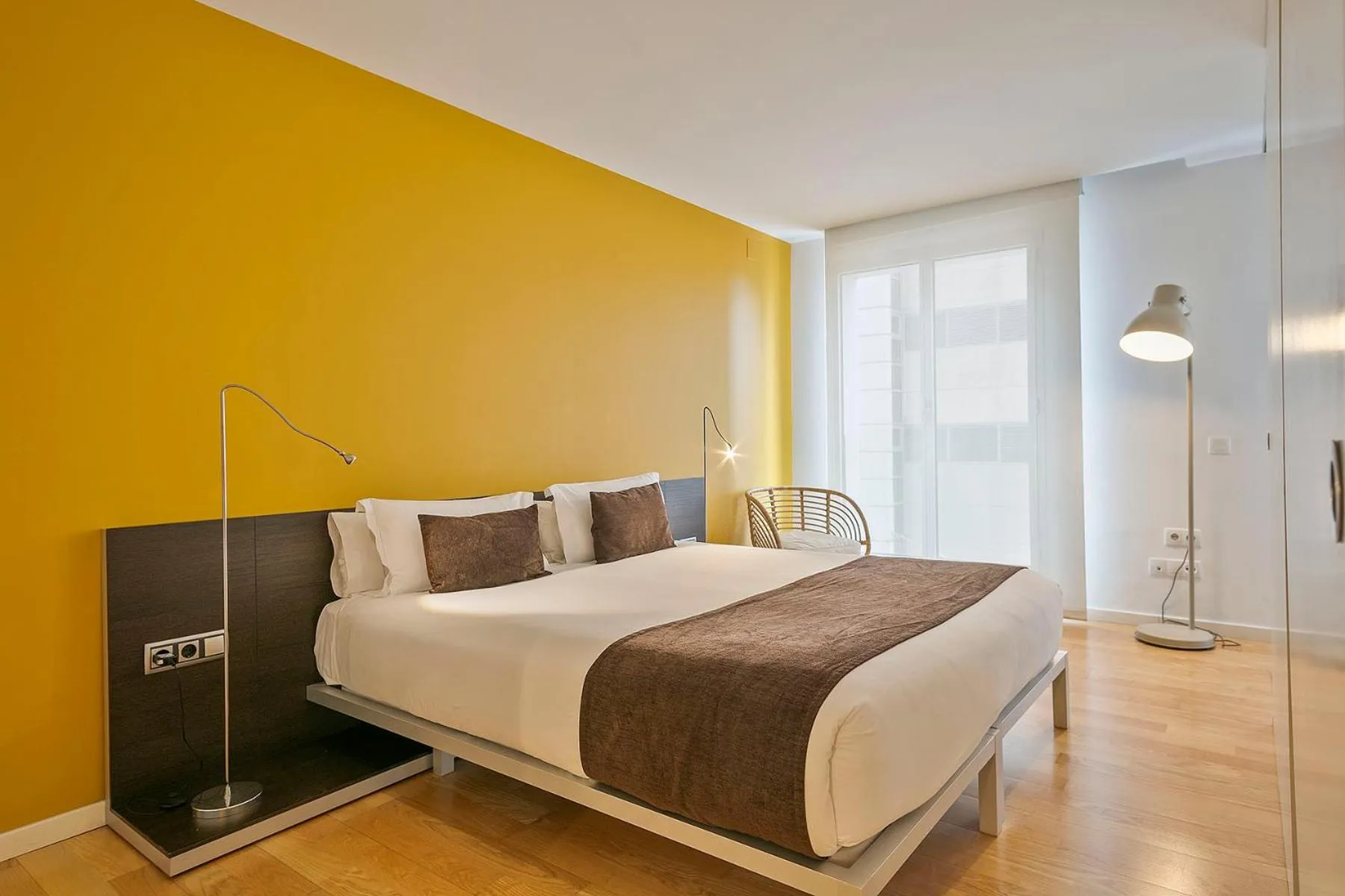 Bed in Lugaris Beach Apartments