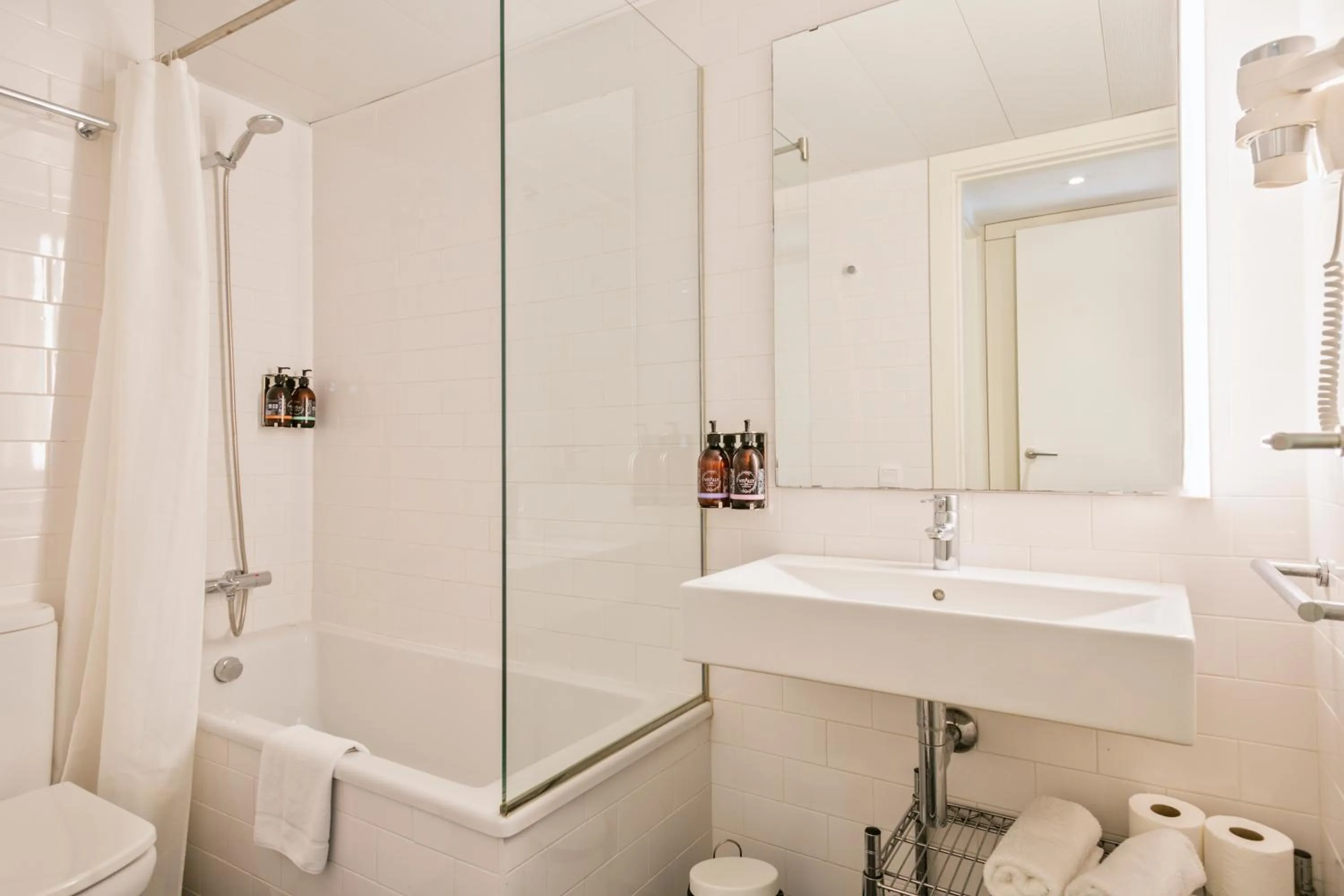 Bathroom in Lugaris Beach Apartments