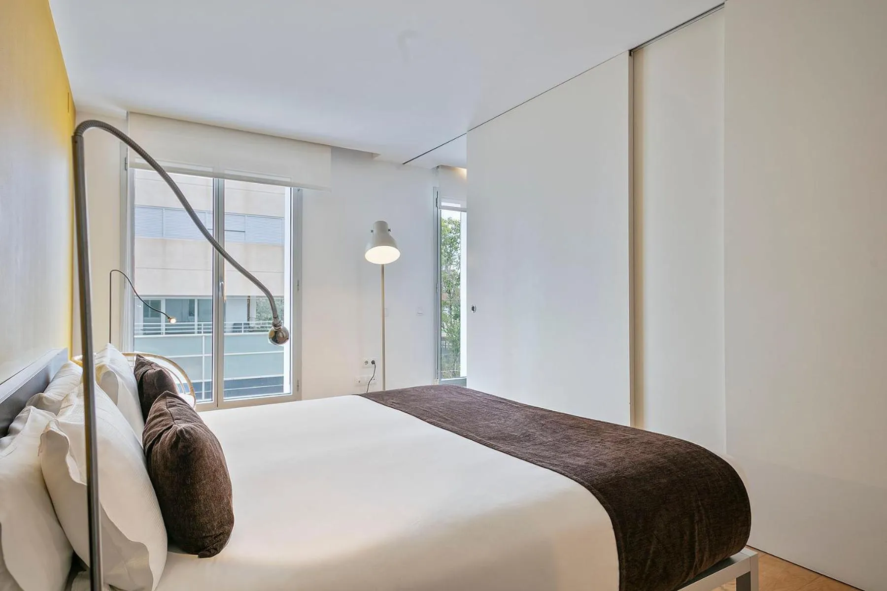 Bed in Lugaris Beach Apartments