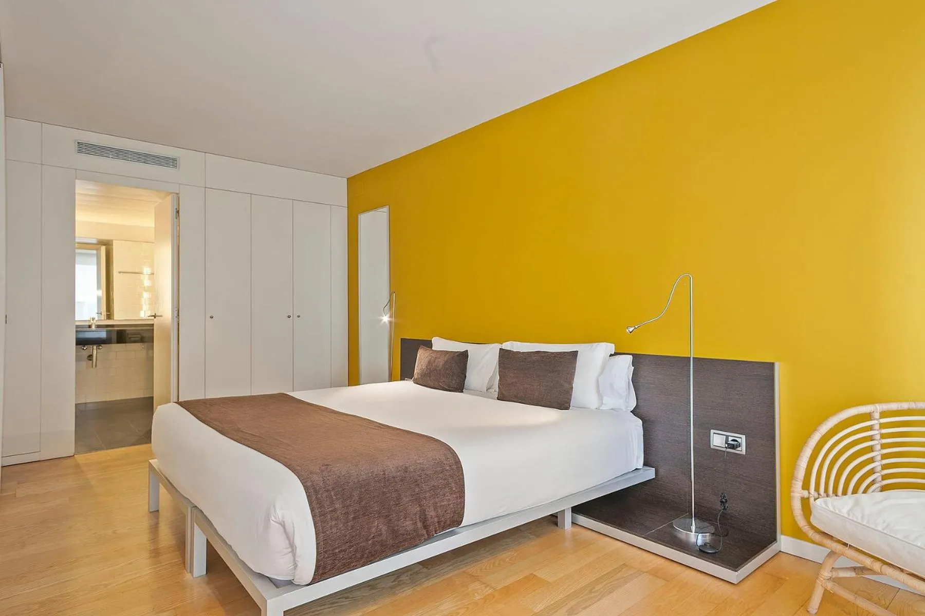 Bed in Lugaris Beach Apartments
