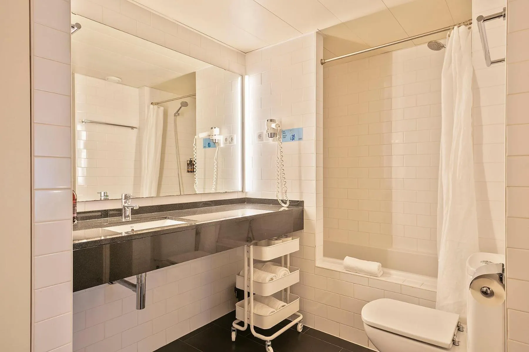 Bathroom in Lugaris Beach Apartments