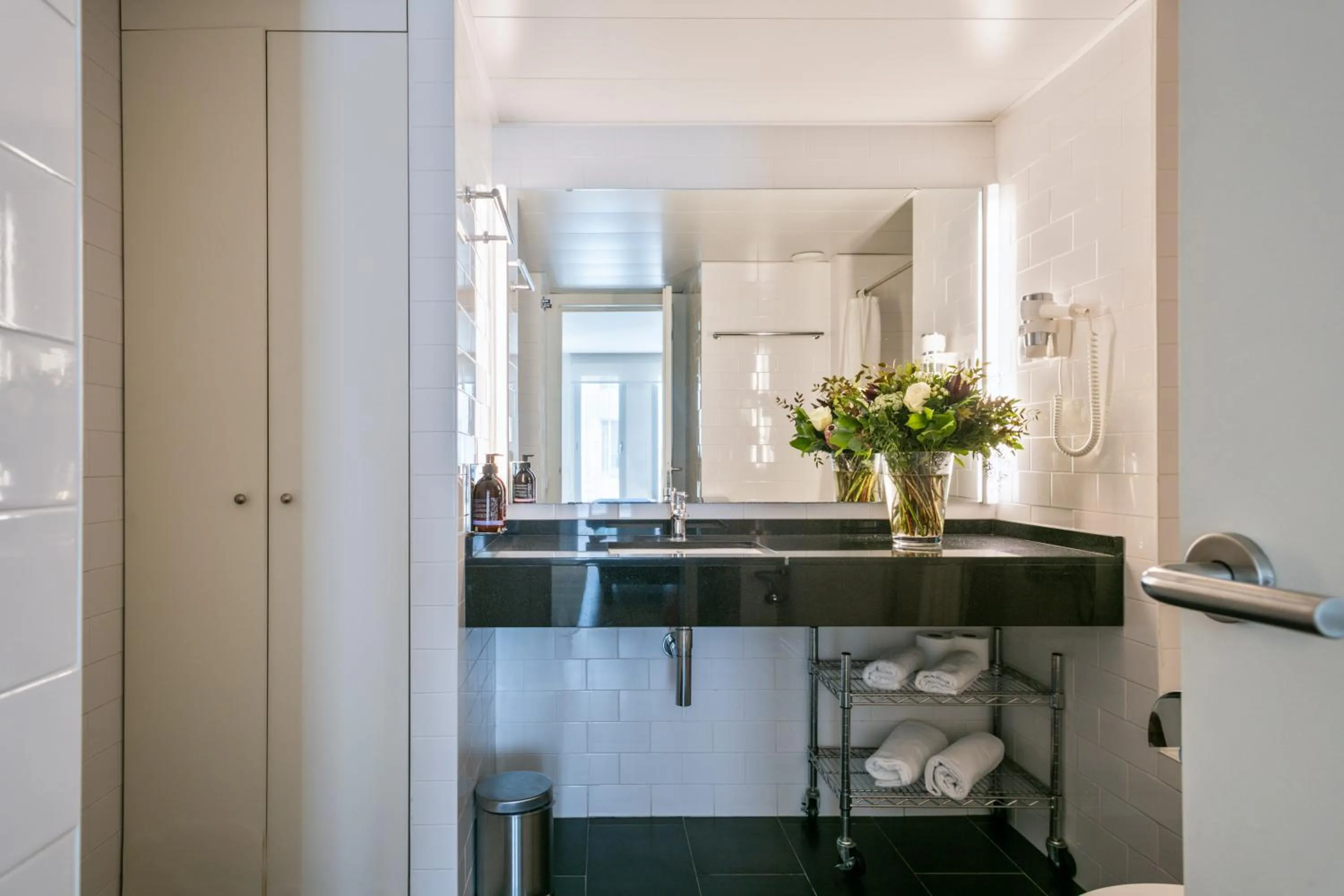 Bathroom in Lugaris Beach Apartments