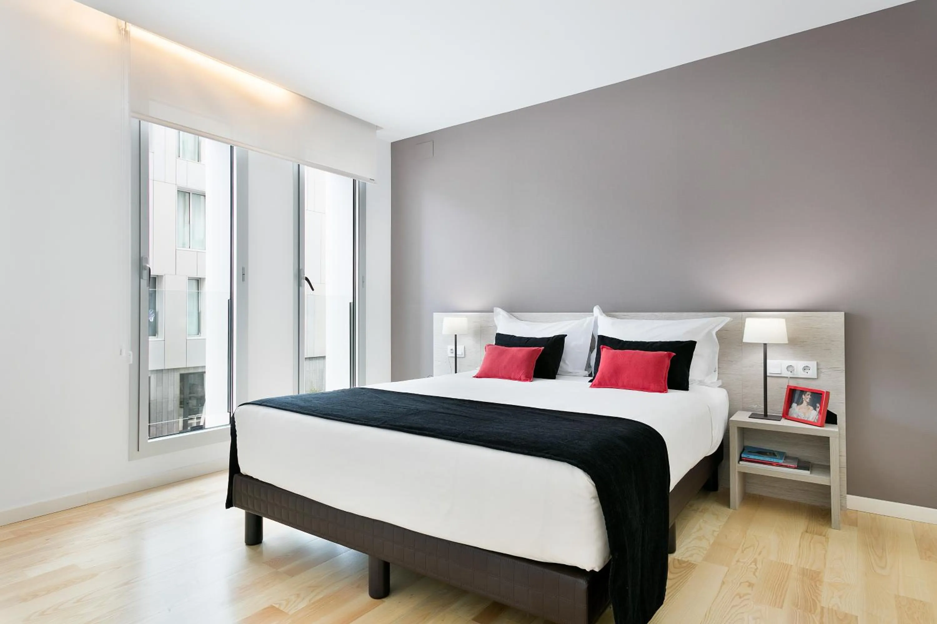 Bed in Lugaris Beach Apartments