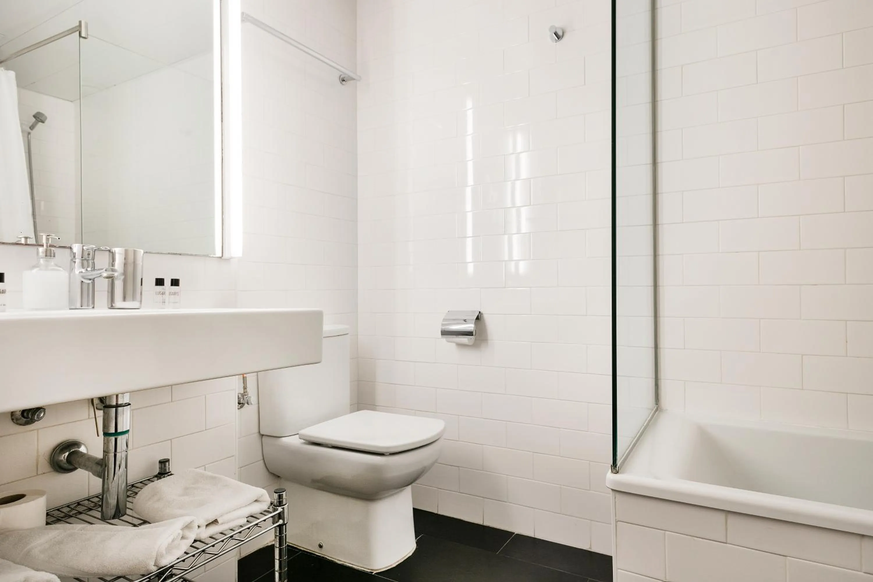 Bathroom in Lugaris Beach Apartments