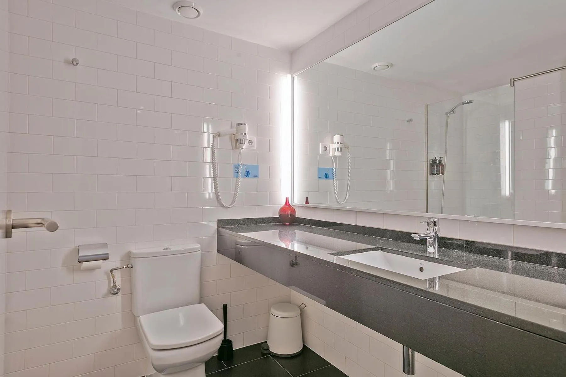 Bathroom in Lugaris Beach Apartments