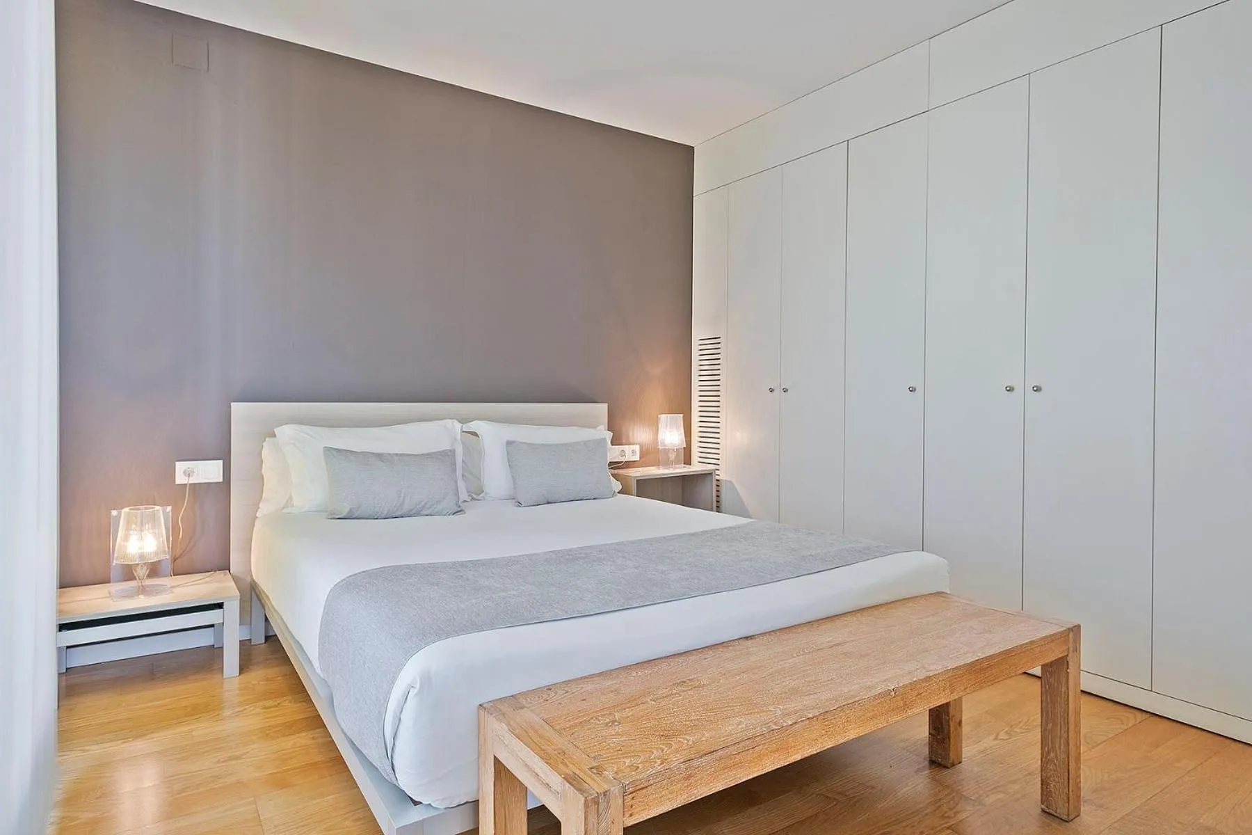Bed in Lugaris Beach Apartments