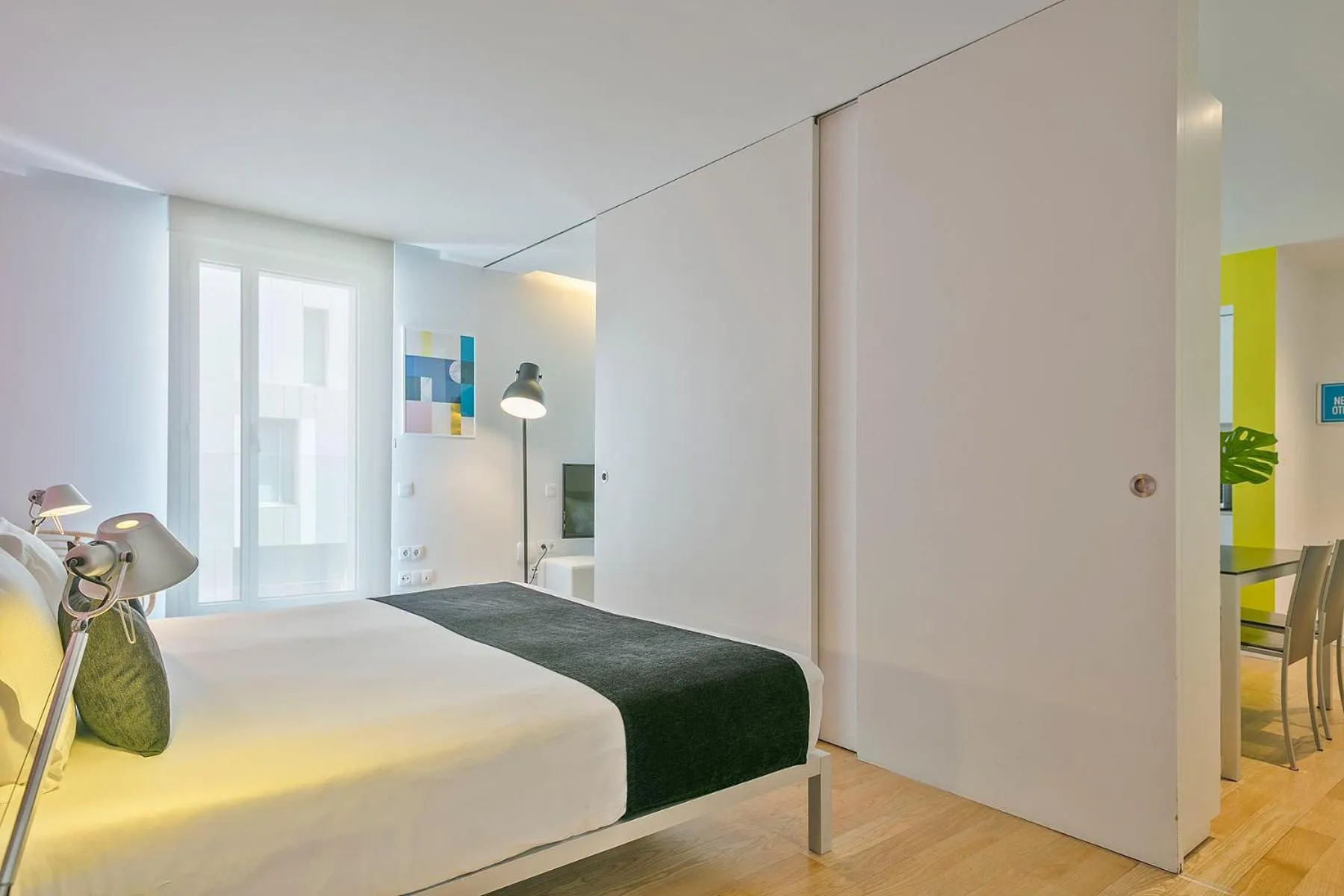 Bed in Lugaris Beach Apartments