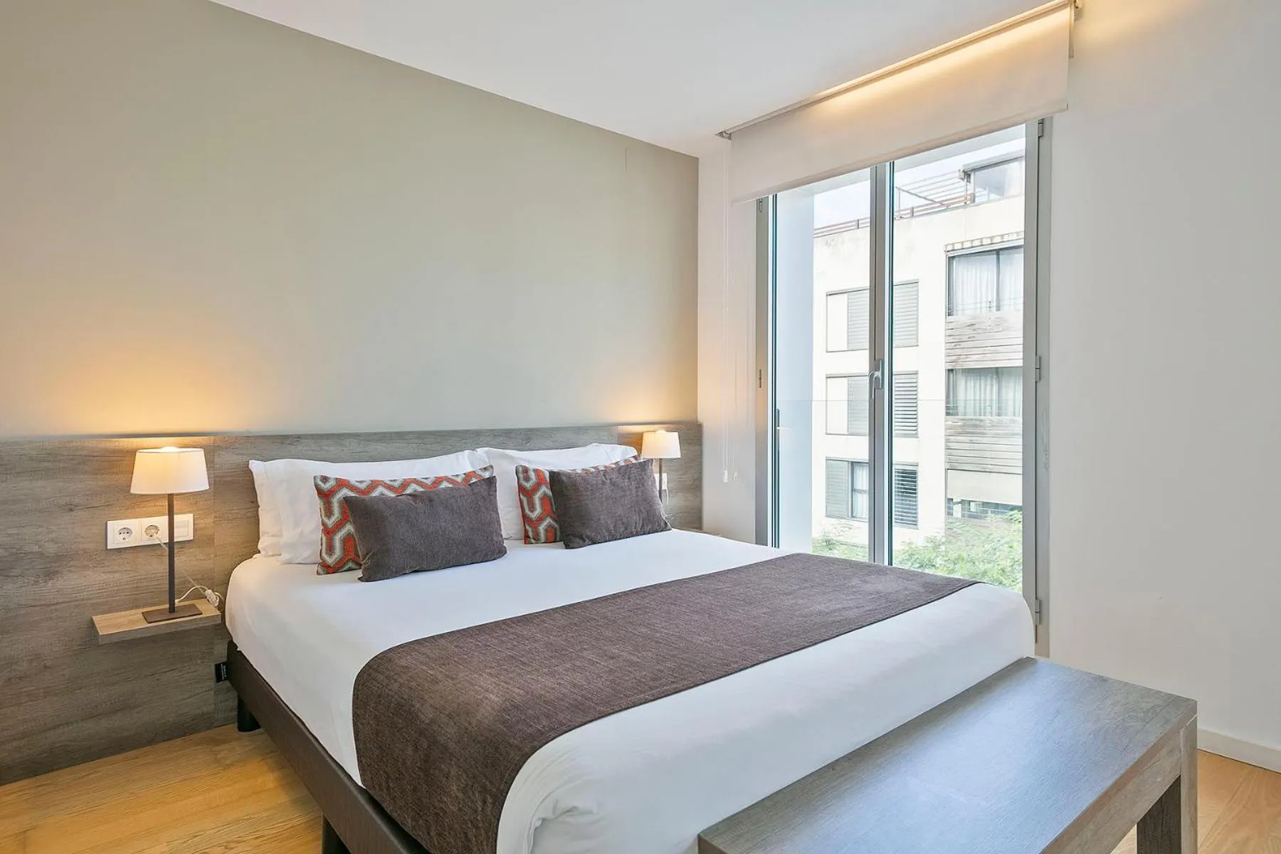 Bed in Lugaris Beach Apartments