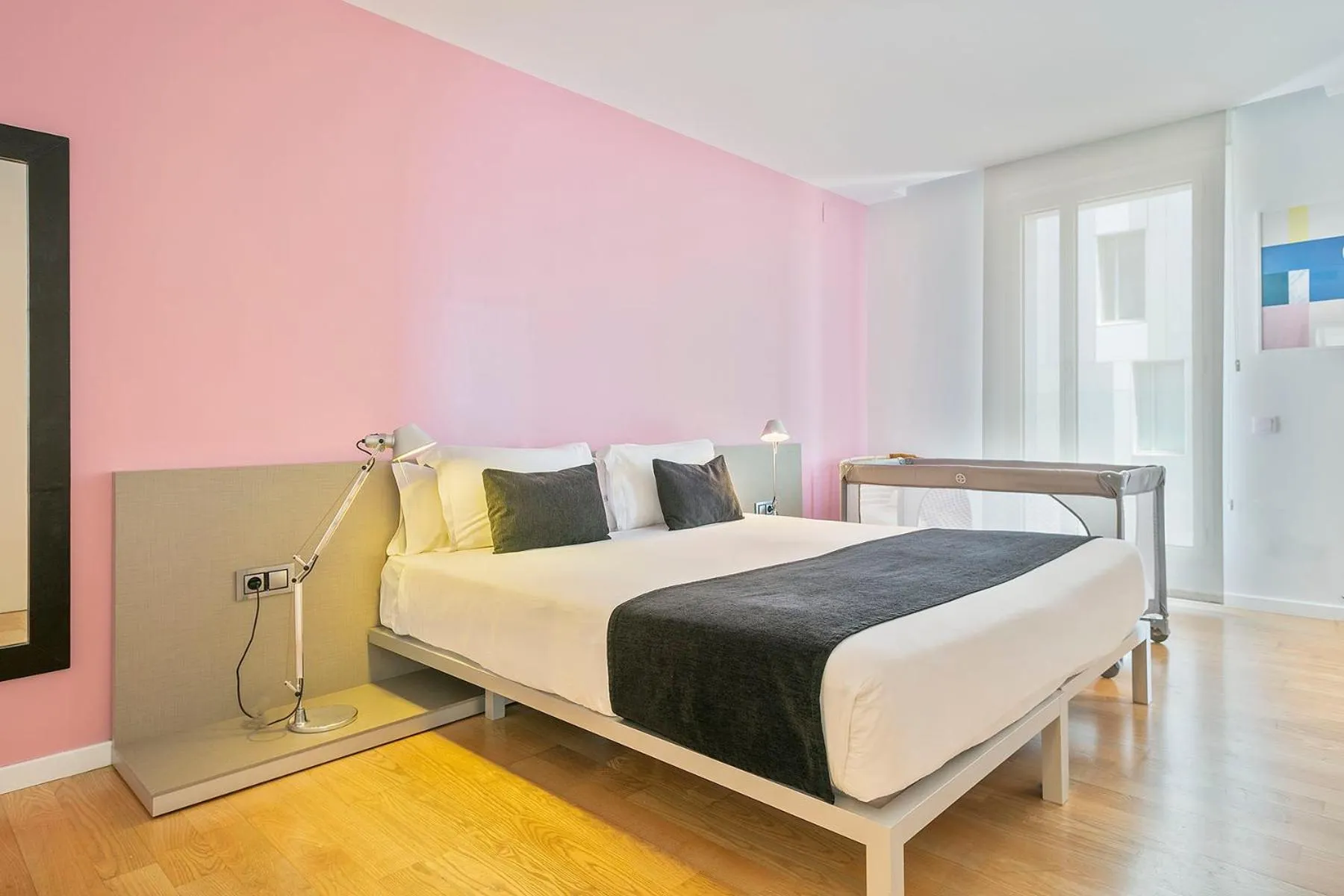 Bed in Lugaris Beach Apartments
