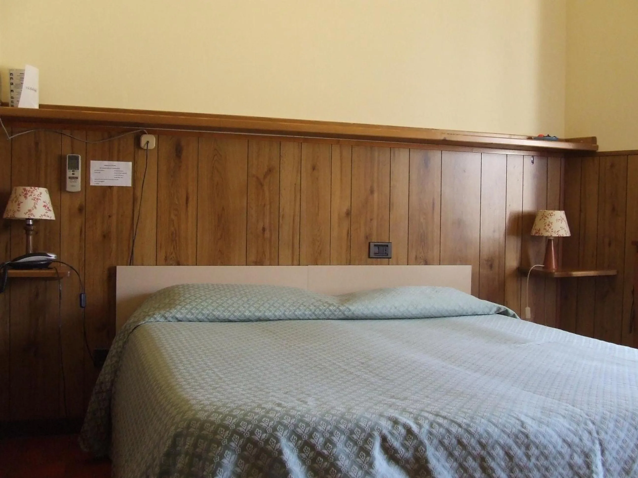 Bed in Albergo Il Cochino