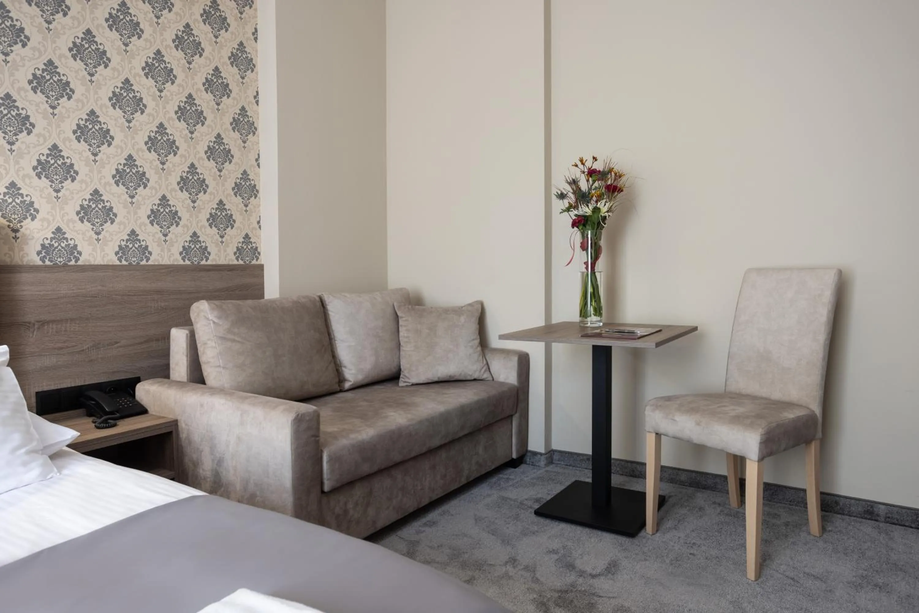 Seating area, Bed in Hotel Maksymilian