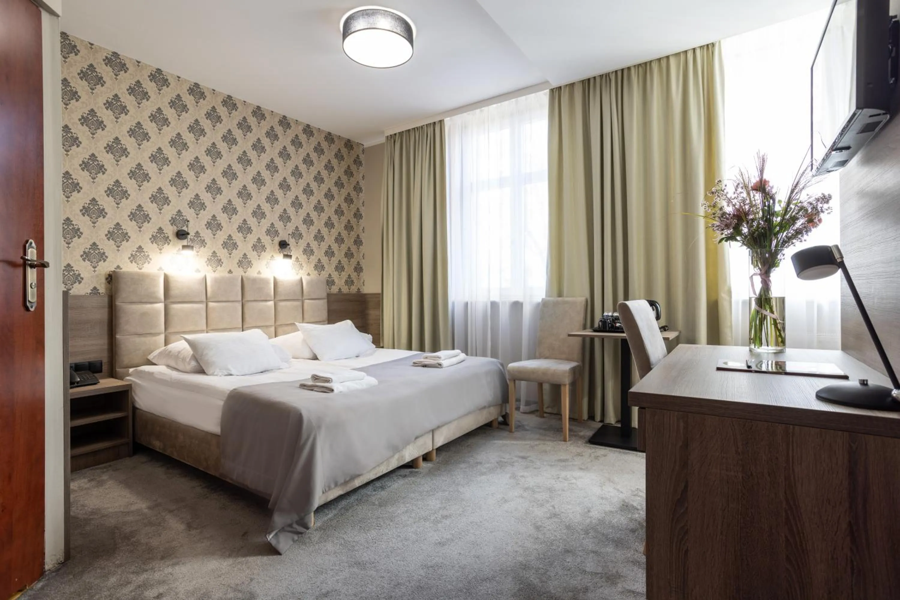 Bed in Hotel Maksymilian