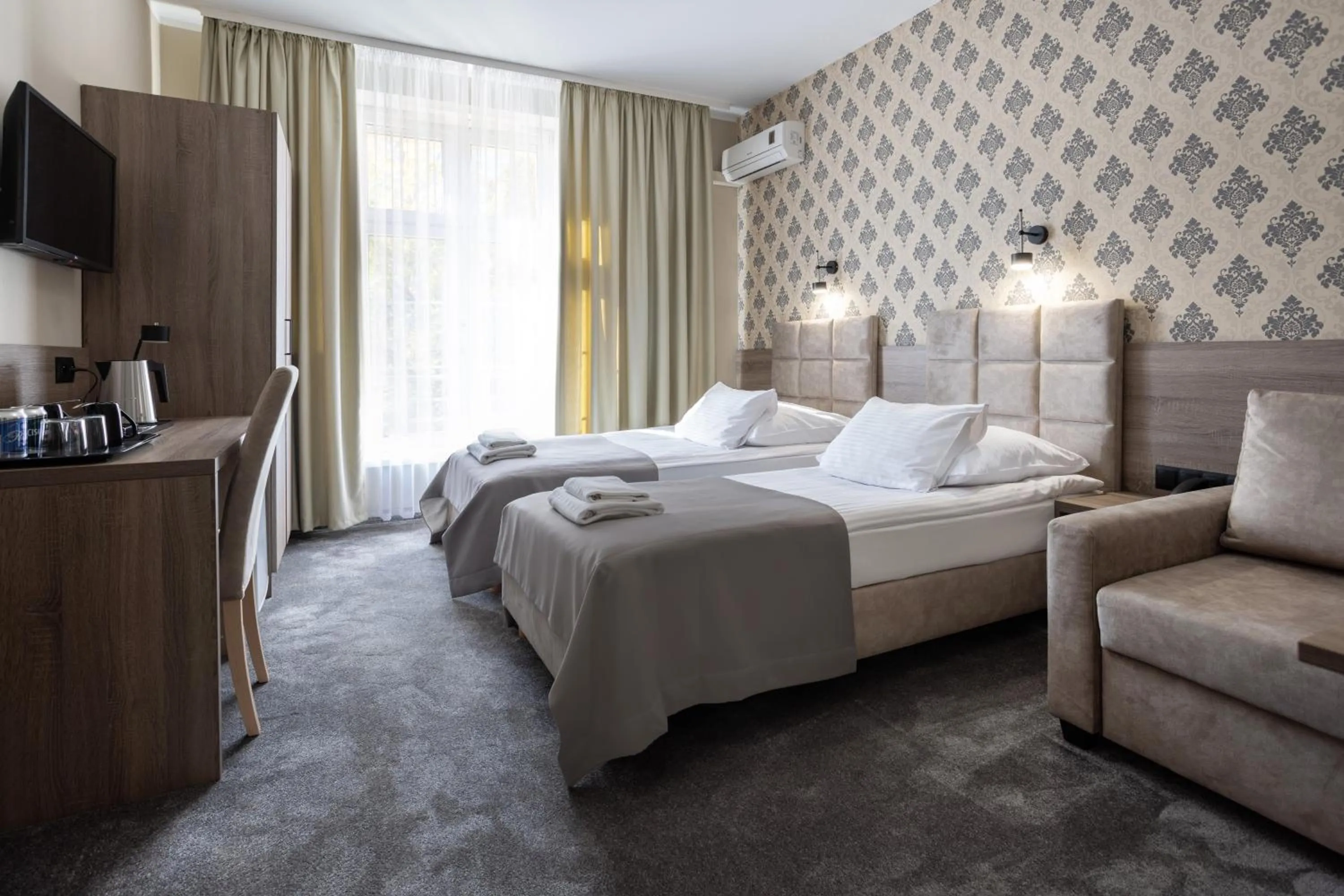 Bed in Hotel Maksymilian