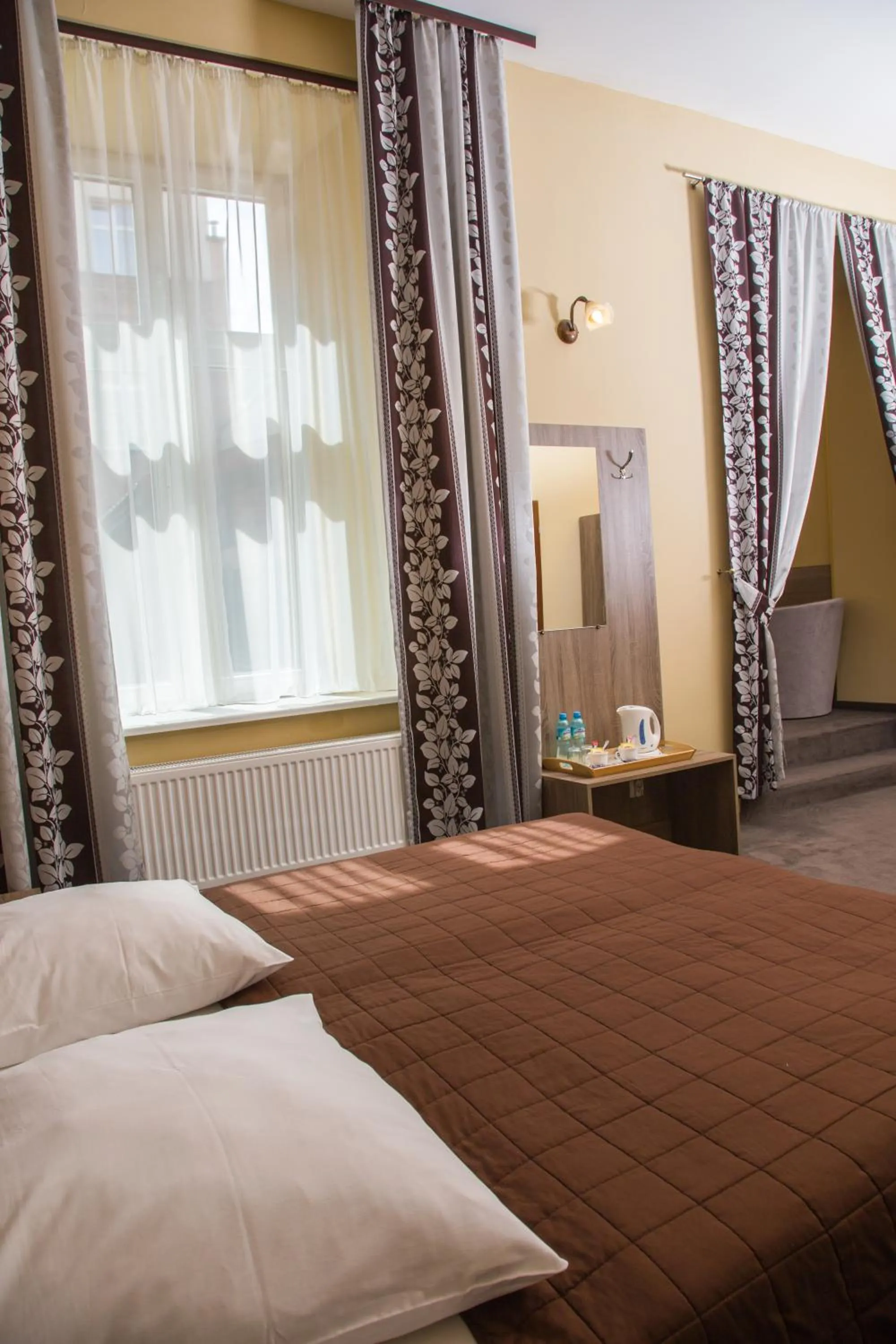 Bed in Hotel Maksymilian