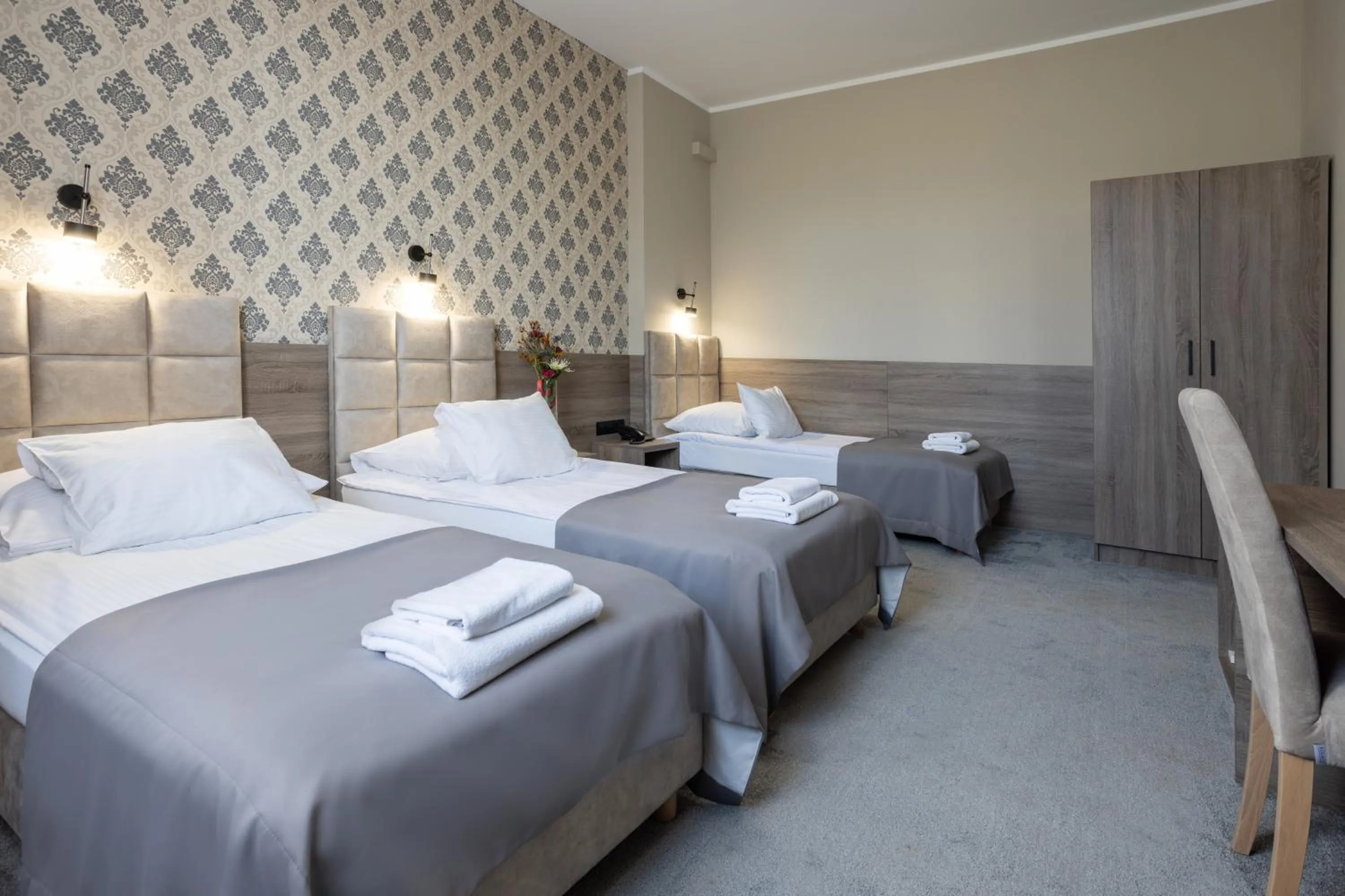 Bed in Hotel Maksymilian