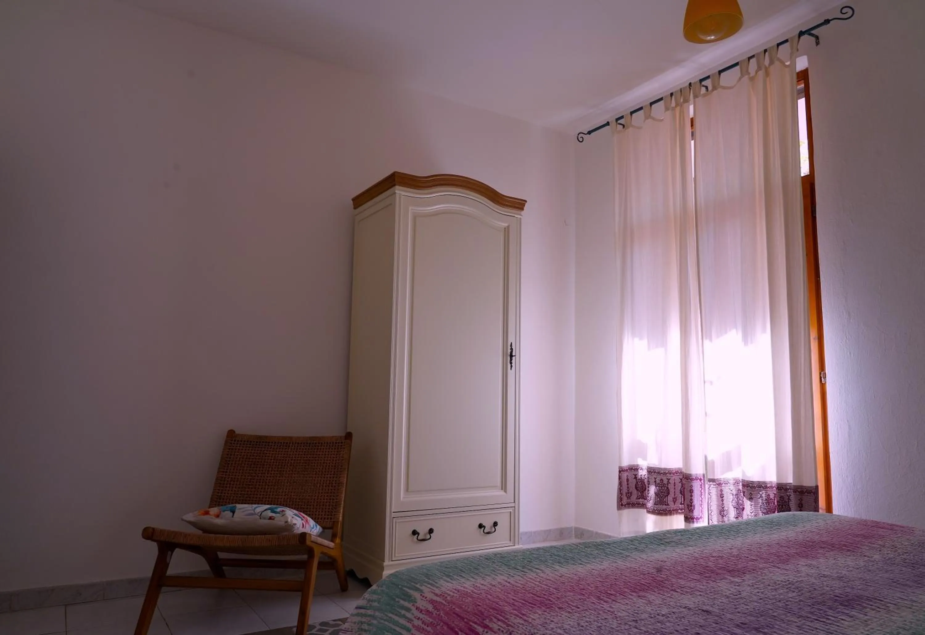 Bed in Flowery Inn Villa