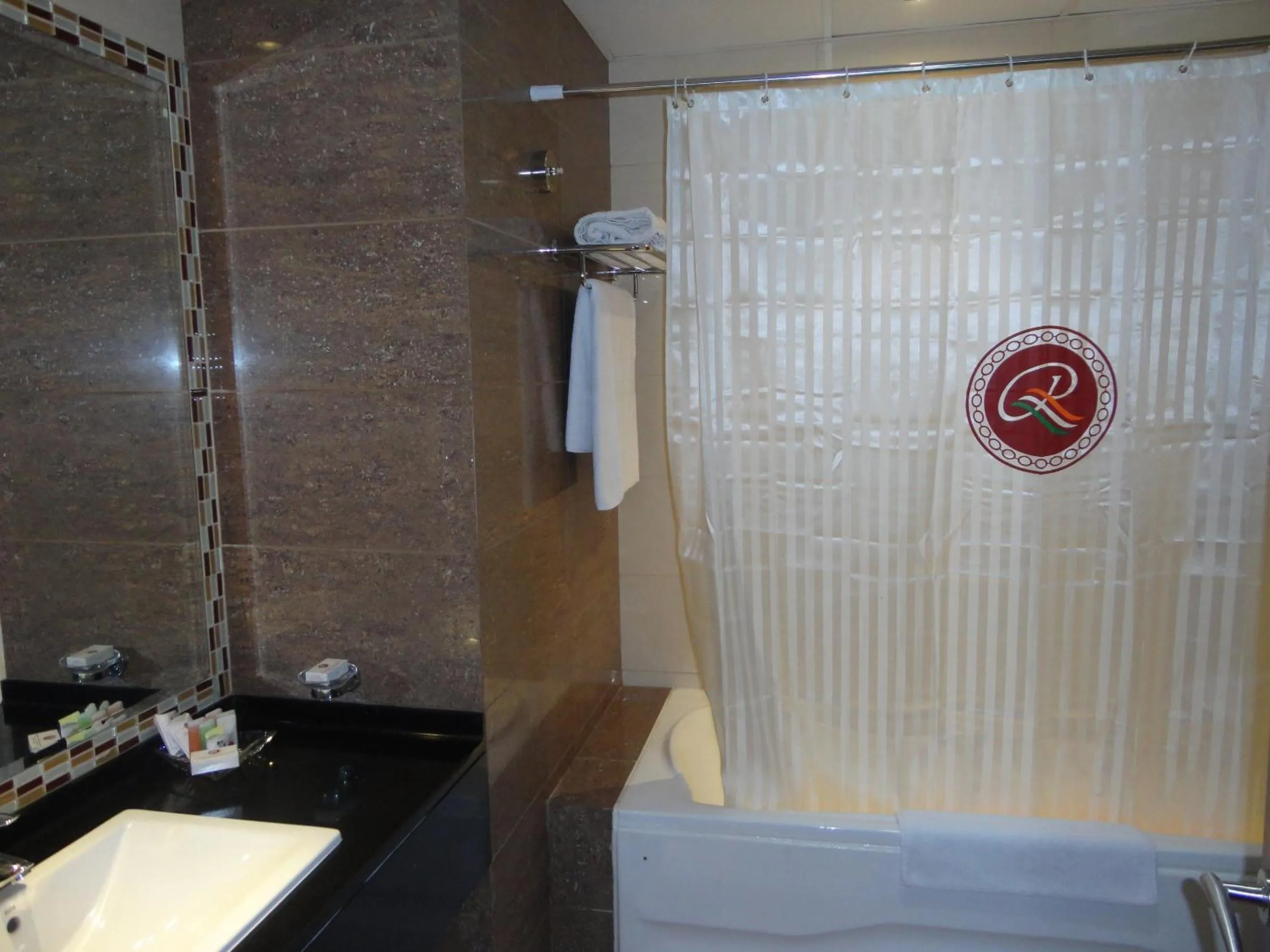 Shower in Ramee Rose Hotel