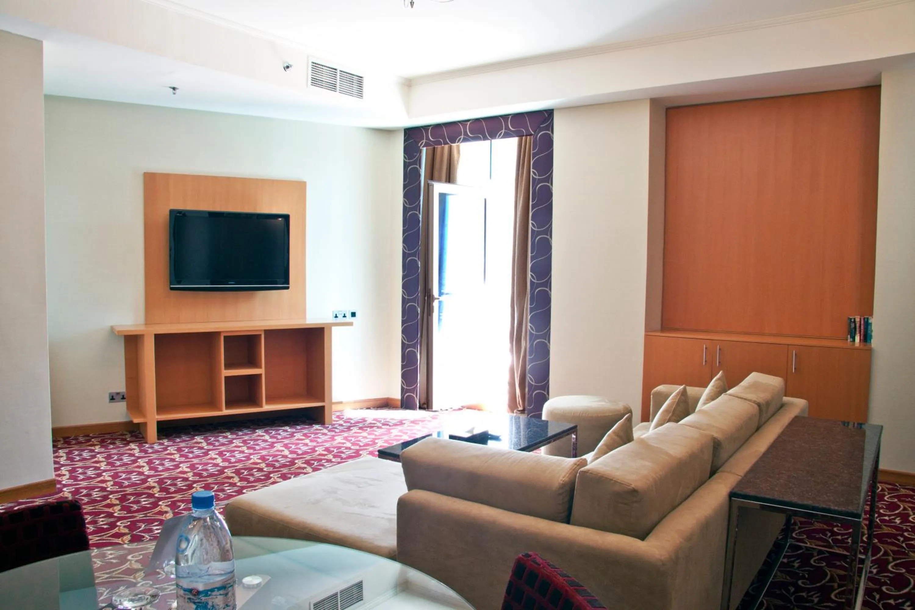 Living room in Ramee Rose Hotel