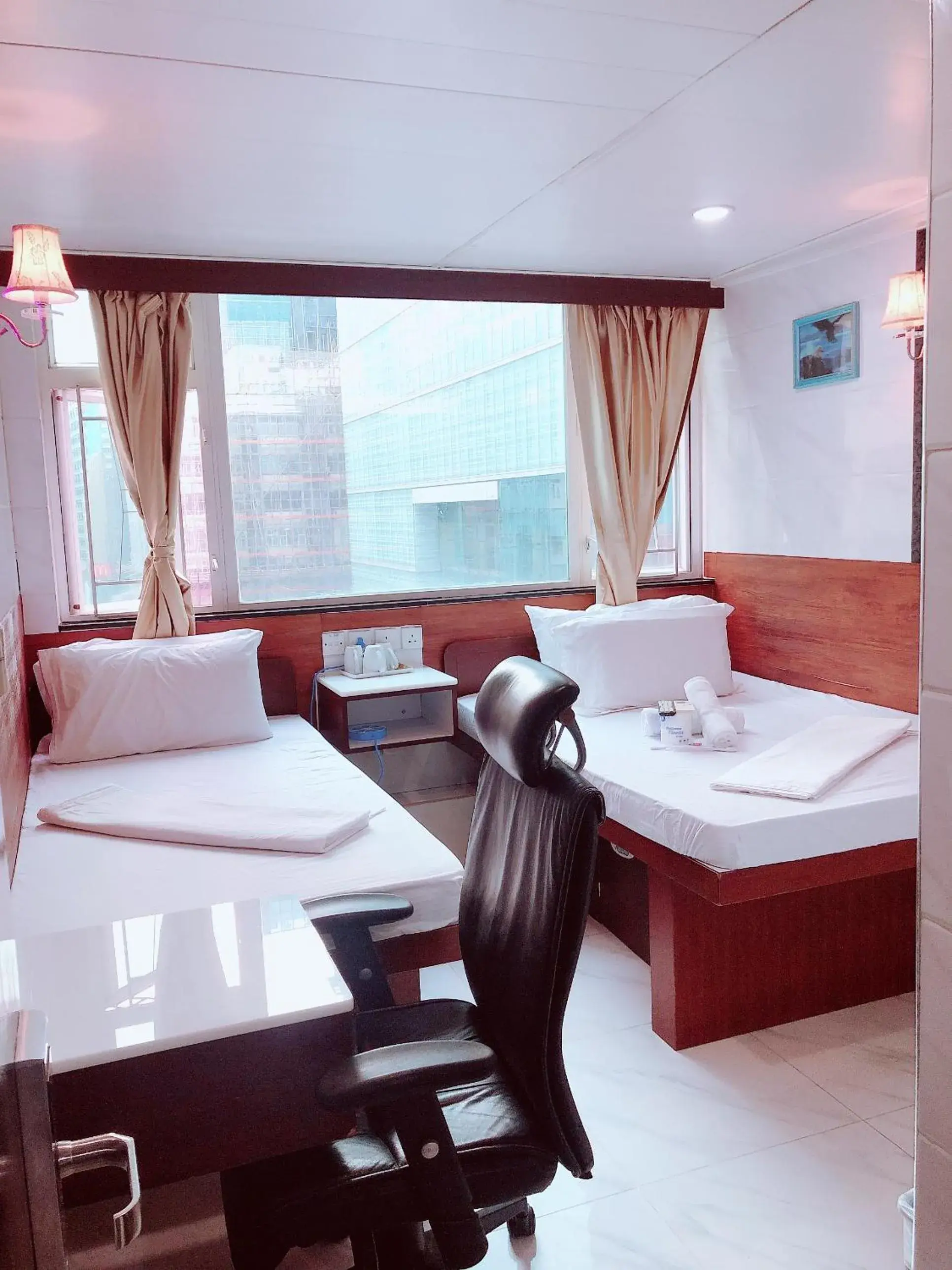 Comfort Quadruple Room in United Co-Operate Guest House (7/F) Comfort Quadruple Room in United Co-Operate Guest House (7/F)