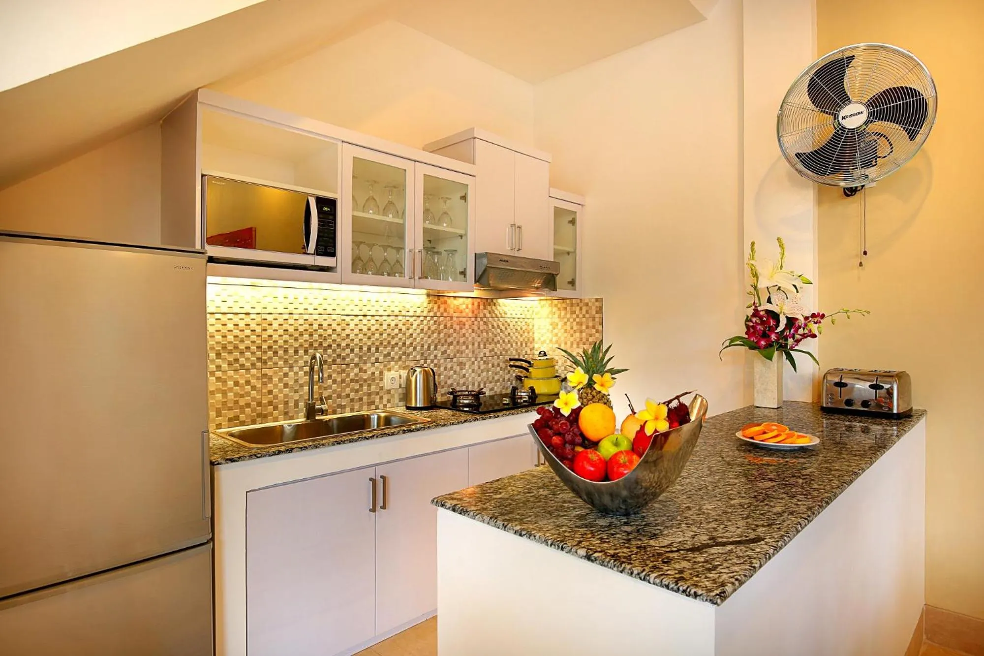 Communal kitchen in De Liza Villa Seminyak Beachside By Bali Asia Villa