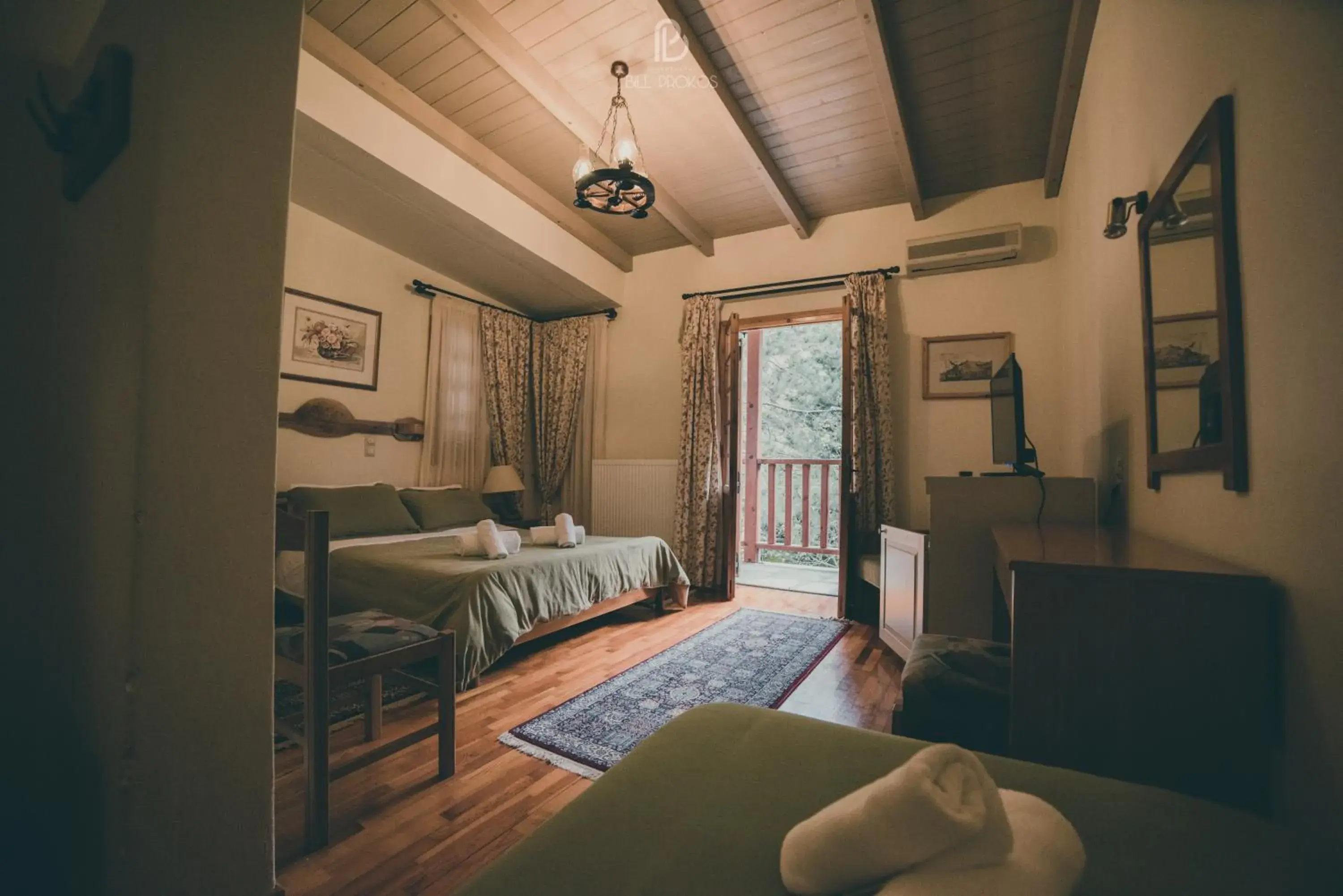 Triple Room with Mountain View in Bourazani Wild Life Resort Triple Room with Mountain View in Bourazani Wild Life Resort