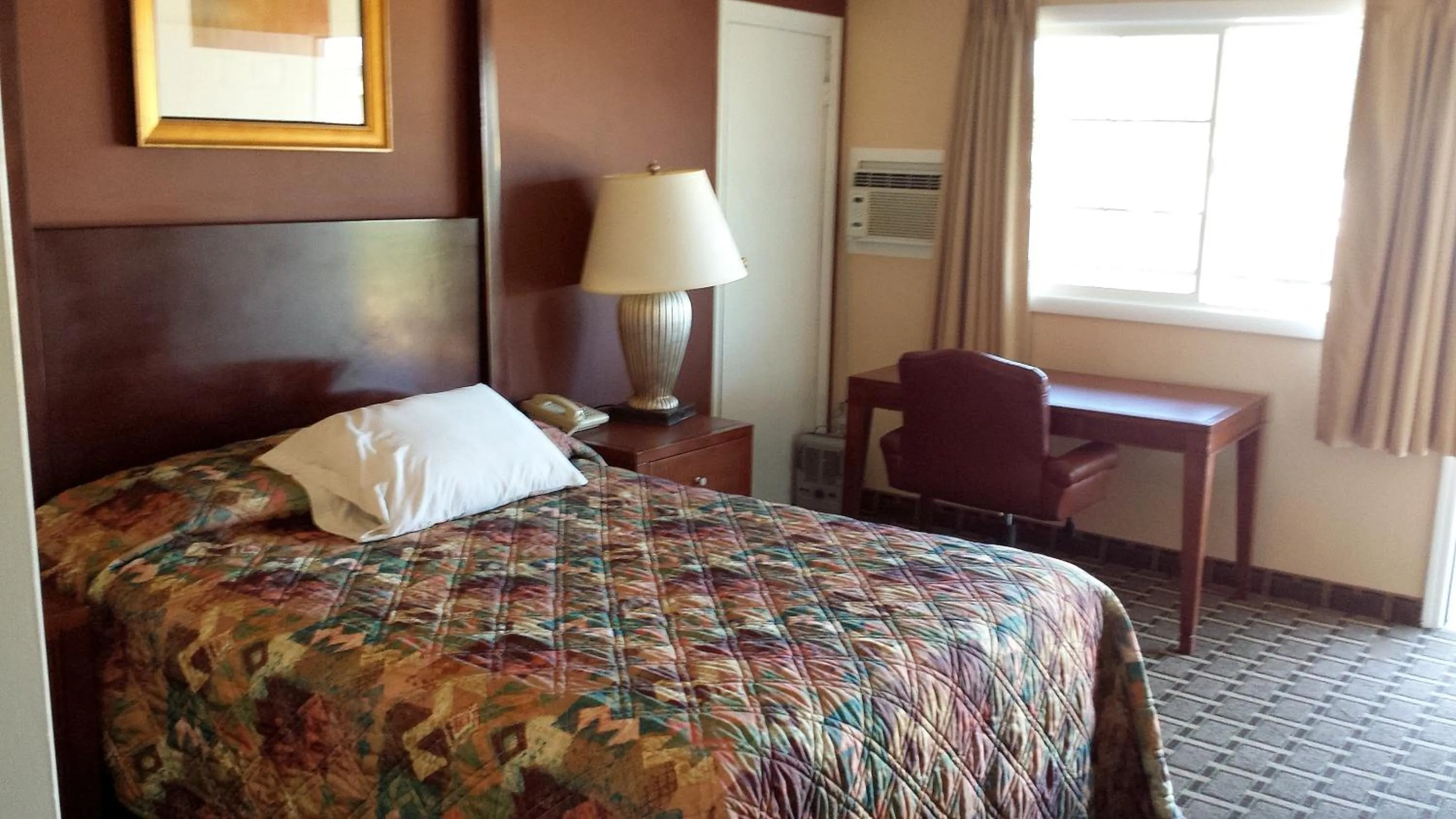 Bedroom in Executive Inn & Suites