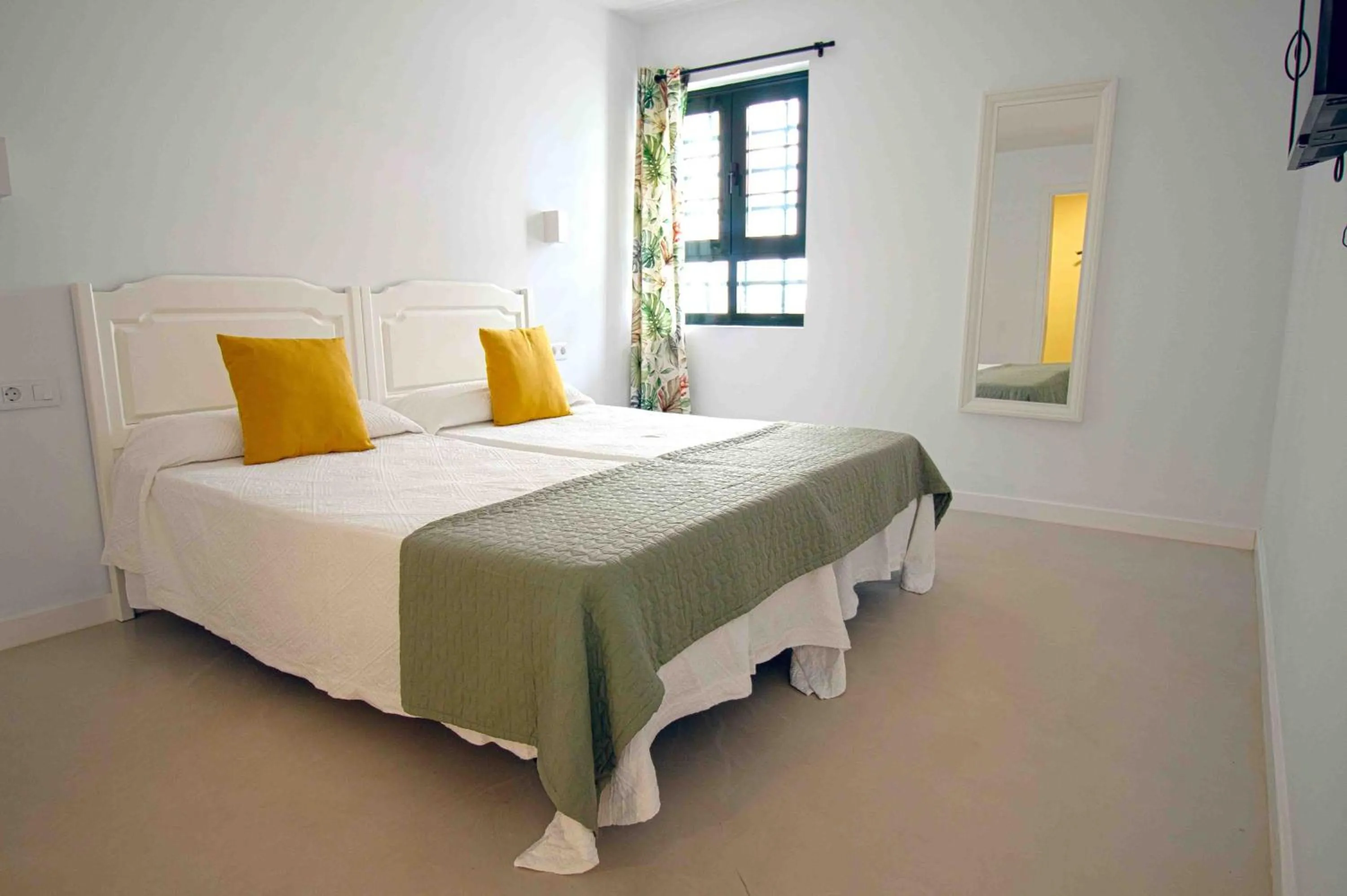 Bed in Apartamentos Moraña