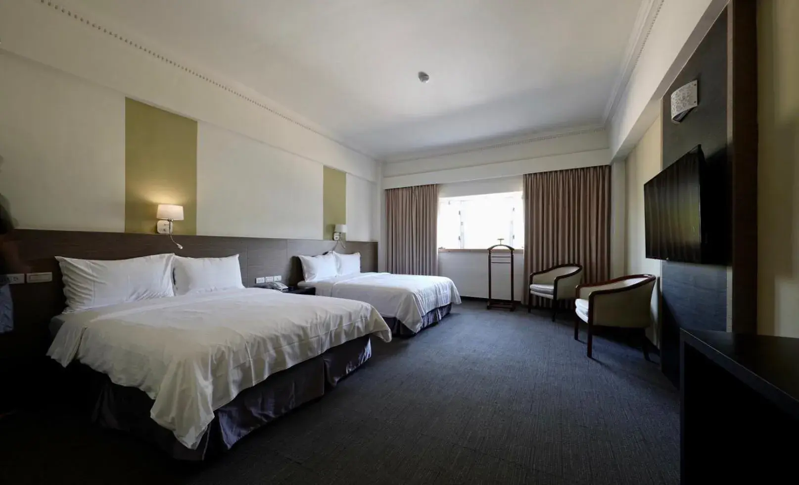 Classic Quadruple Room in Haifu Garden Hotel Classic Quadruple Room in Haifu Garden Hotel