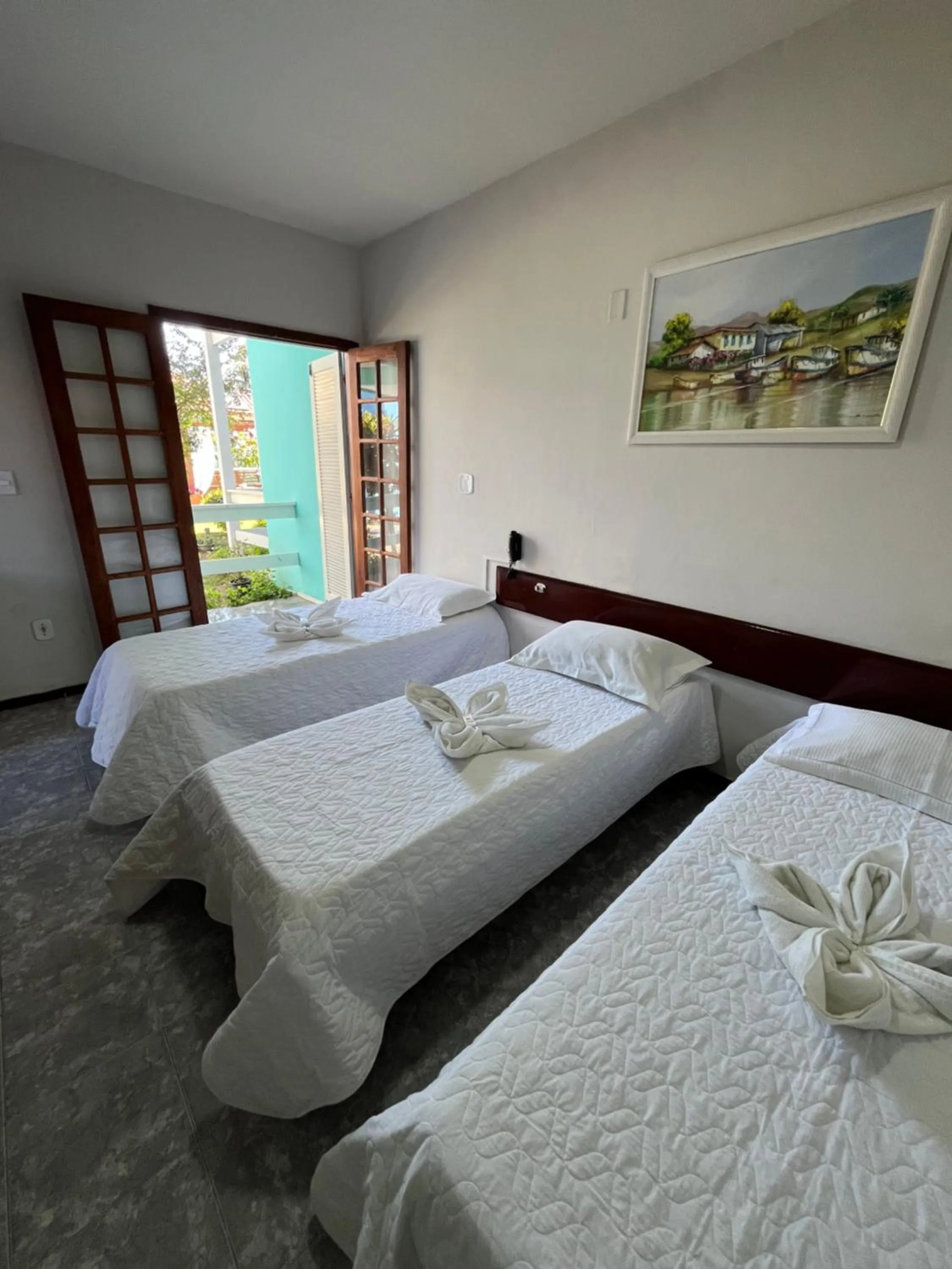 Bed in Pousada Paraíso do Atlântico