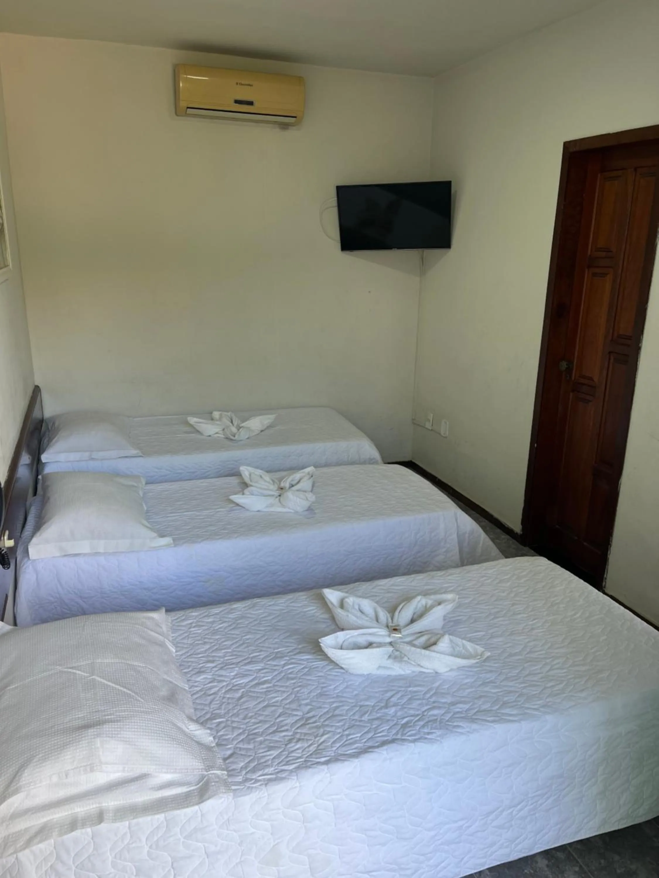 Bed in Pousada Paraíso do Atlântico