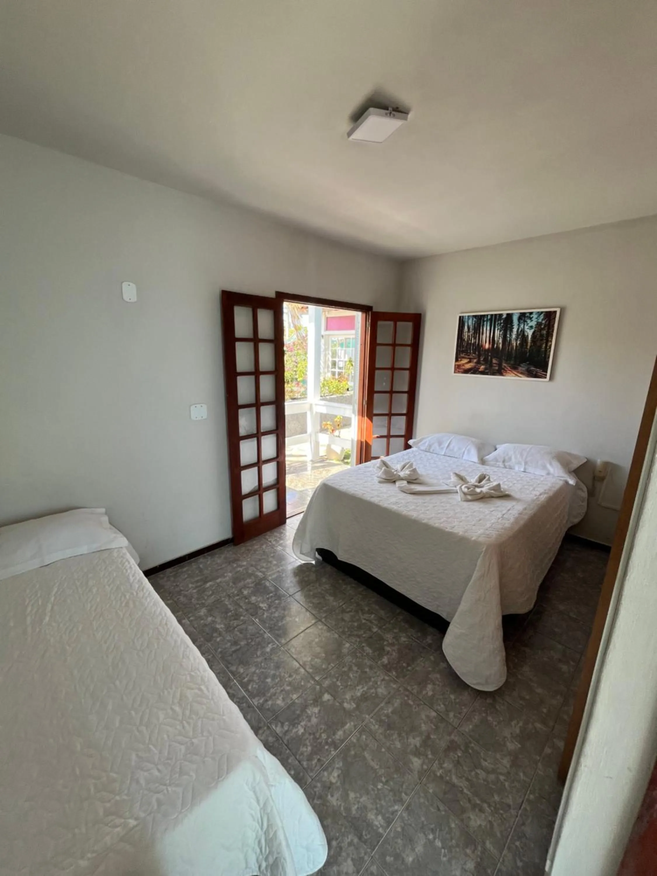 Bed in Pousada Paraíso do Atlântico