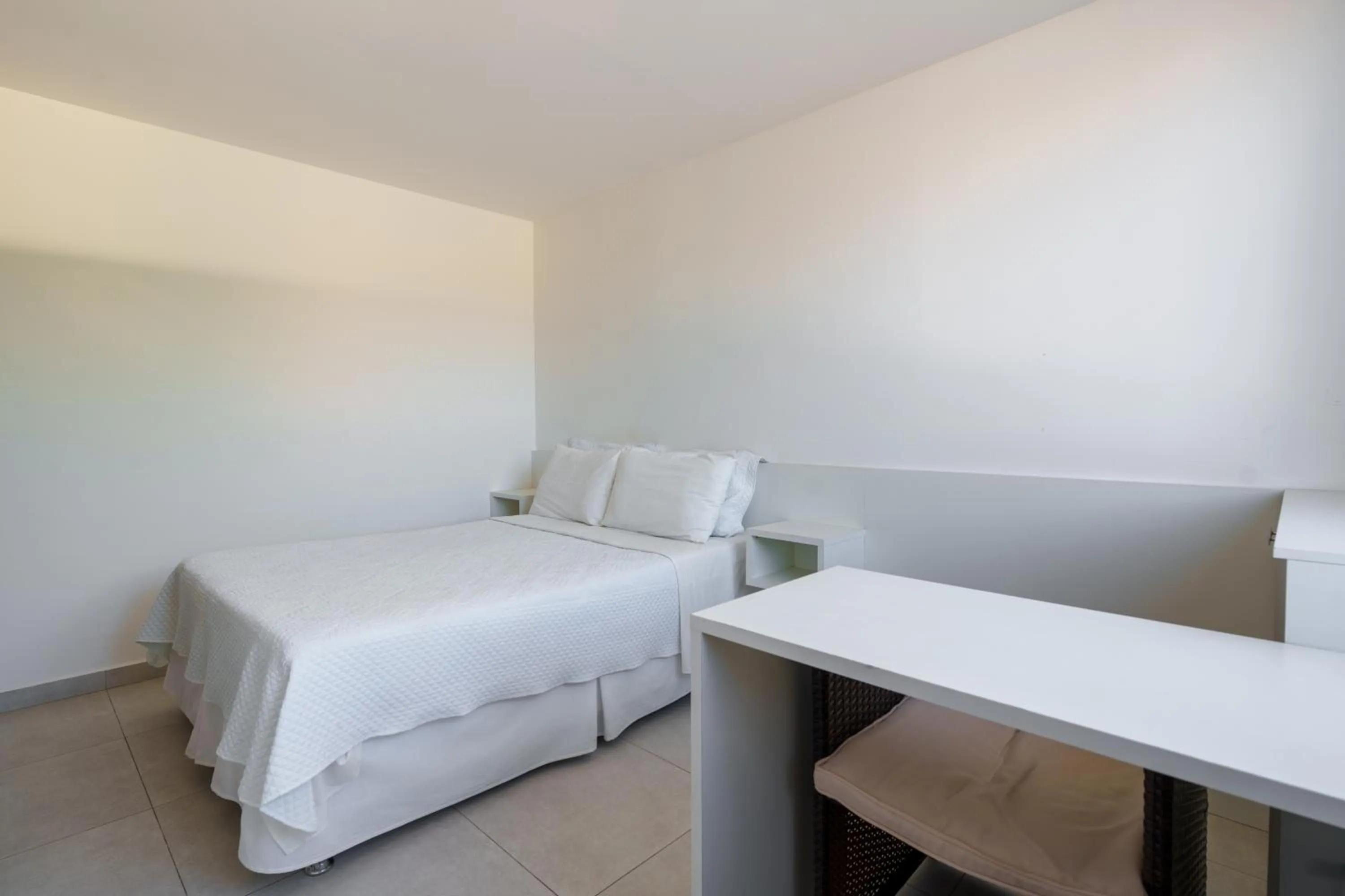 Bed in Pousada do Timoneiro