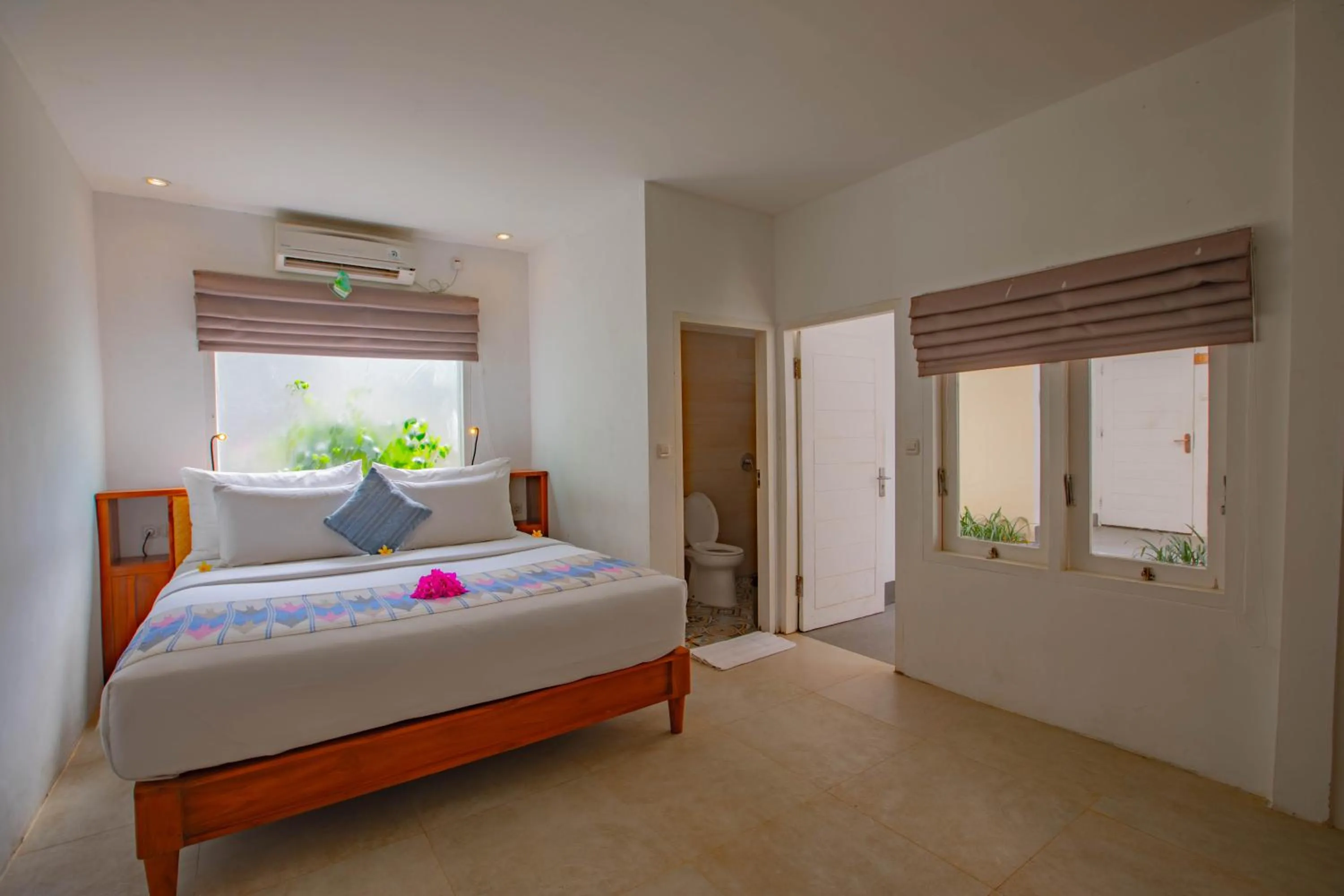 Bed in Gili Sands Hotel & Bar