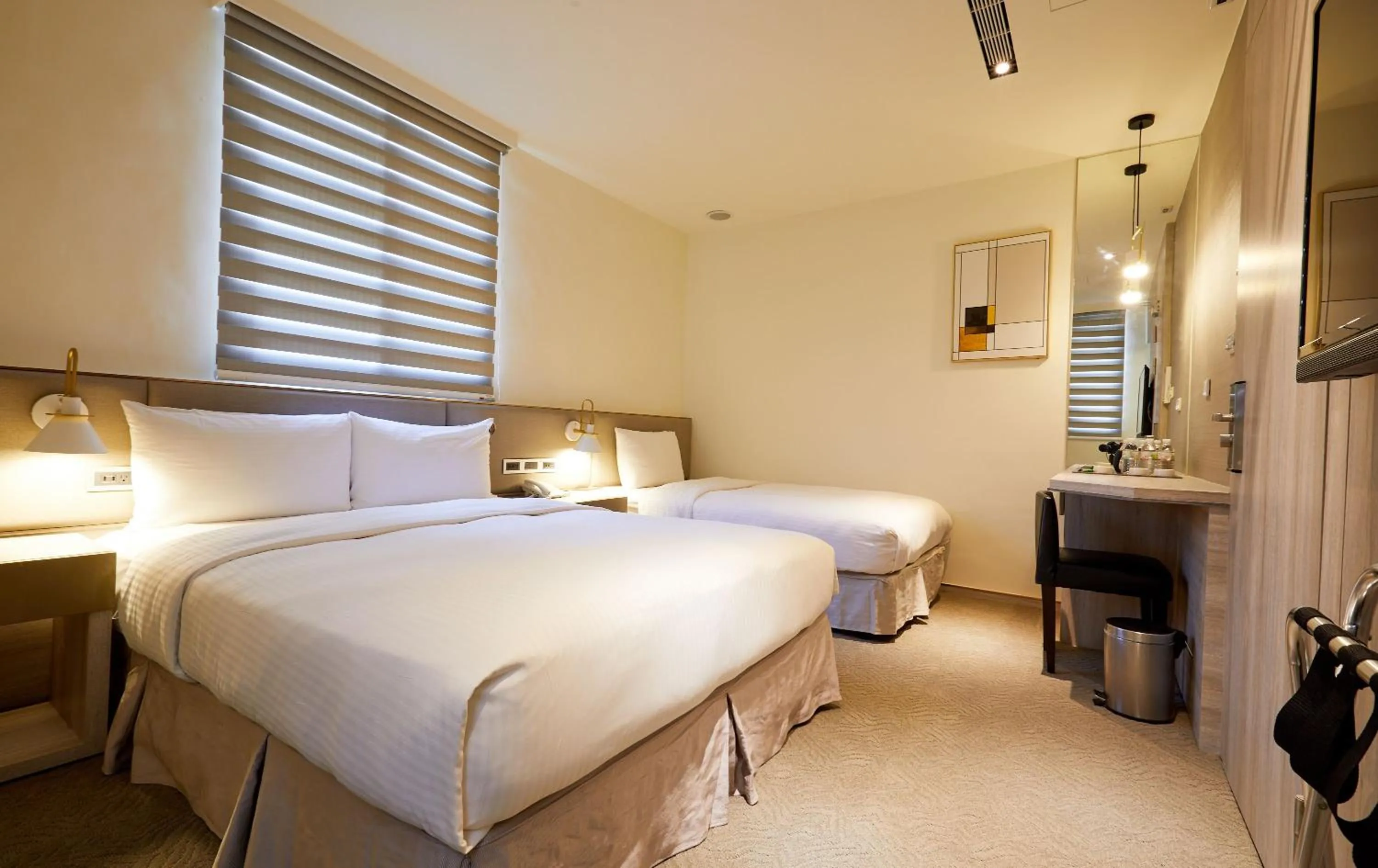 Bed in Hai Fu Hotel & Suites