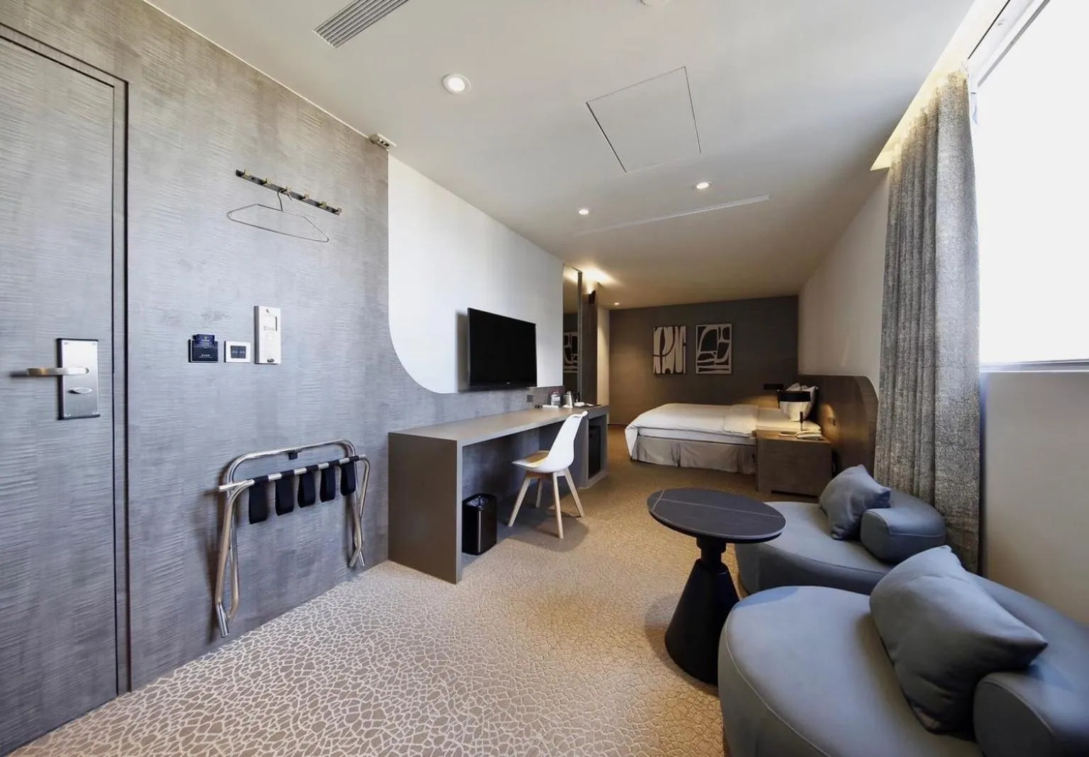 Living room, Bed in Hai Fu Hotel & Suites