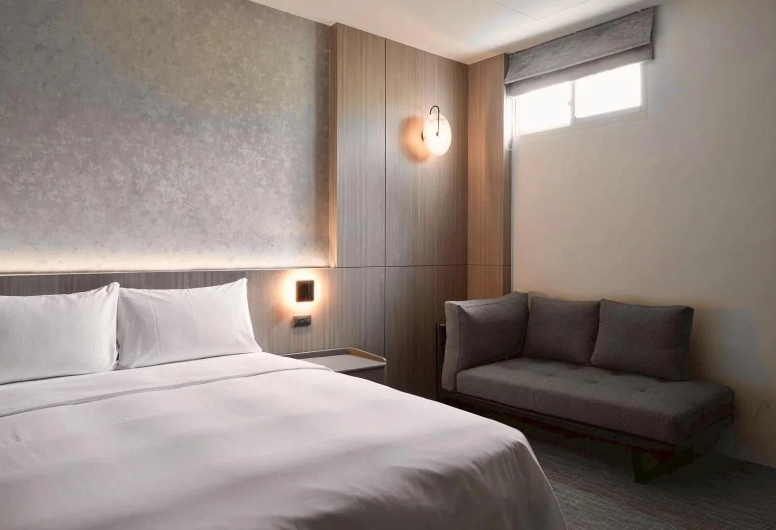 Bed in Hai Fu Hotel & Suites